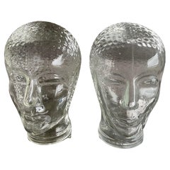 Pair of glass hat heads