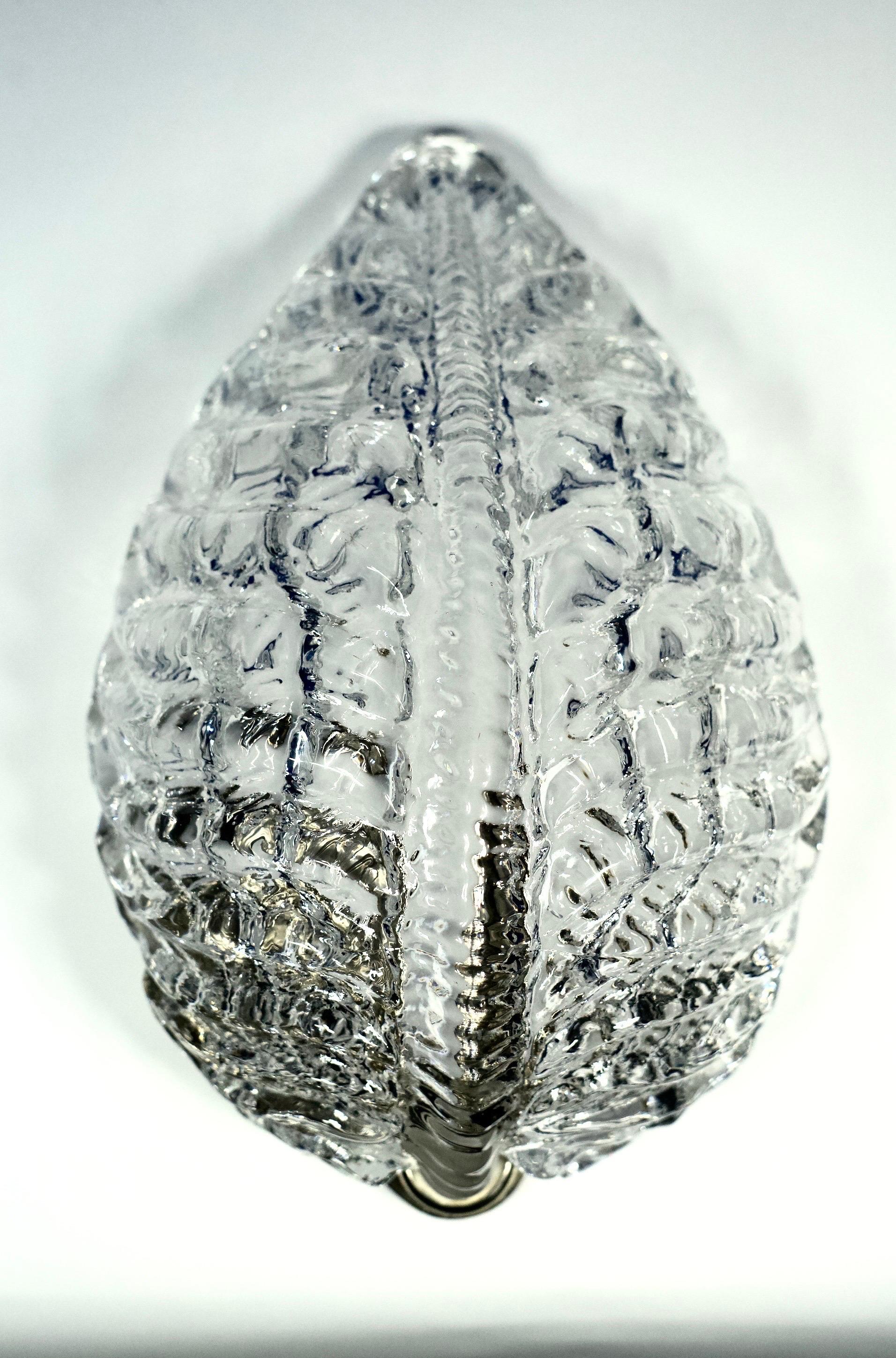 Coppia di applique Orrefors a forma di foglia, Svezia 1970, Vetro trasparente pressato a forma di foglia.



Prezzo a coppia.

Ricablata per gli Stati Uniti.
Può essere classificato UL per ambienti asciutti o umidi.

Può contenere una lampadina a