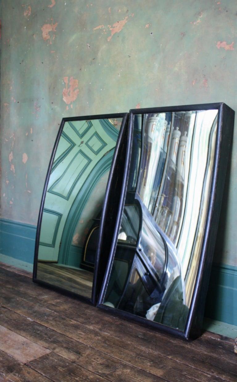 A rare pair of obverse fairground mirrors, housed in their original pine frames and ebonised finish.



The original concave and convex optical glass is of sound condition with minor surface wear considering the nature of a travelling