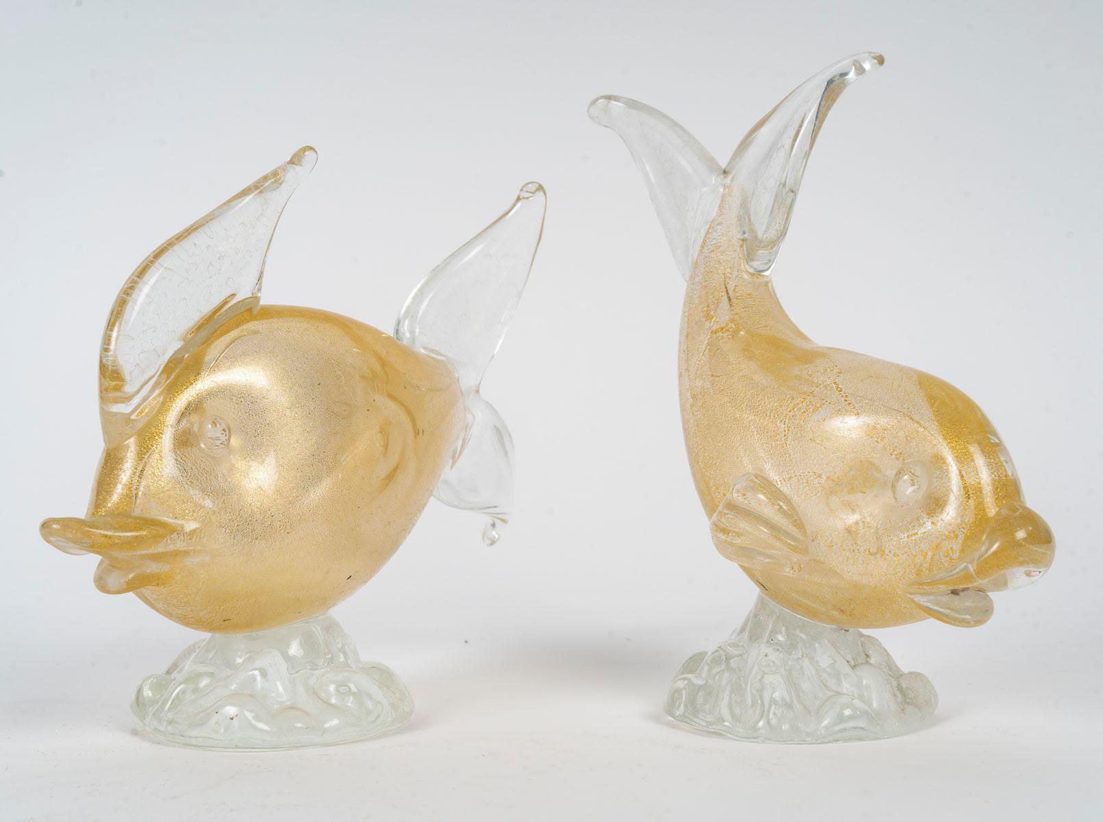 Pair of glass sculptures of a fish, Murano, 20th century.

Pair of Murano glass sculptures of a fish, Italian work, 20th century, modern art.
H: 17cm, W: 16cm, D: 7cm