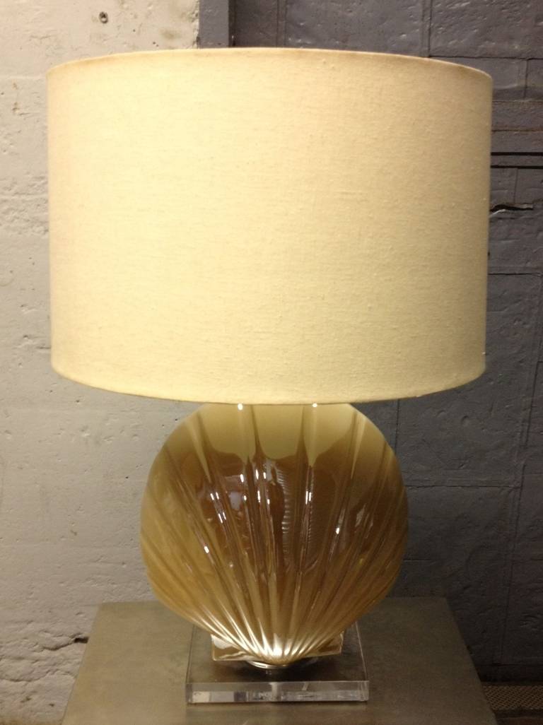 Pair of glass shell form lamps with Lucite bases.
Shades not included.
Measures: 27.5