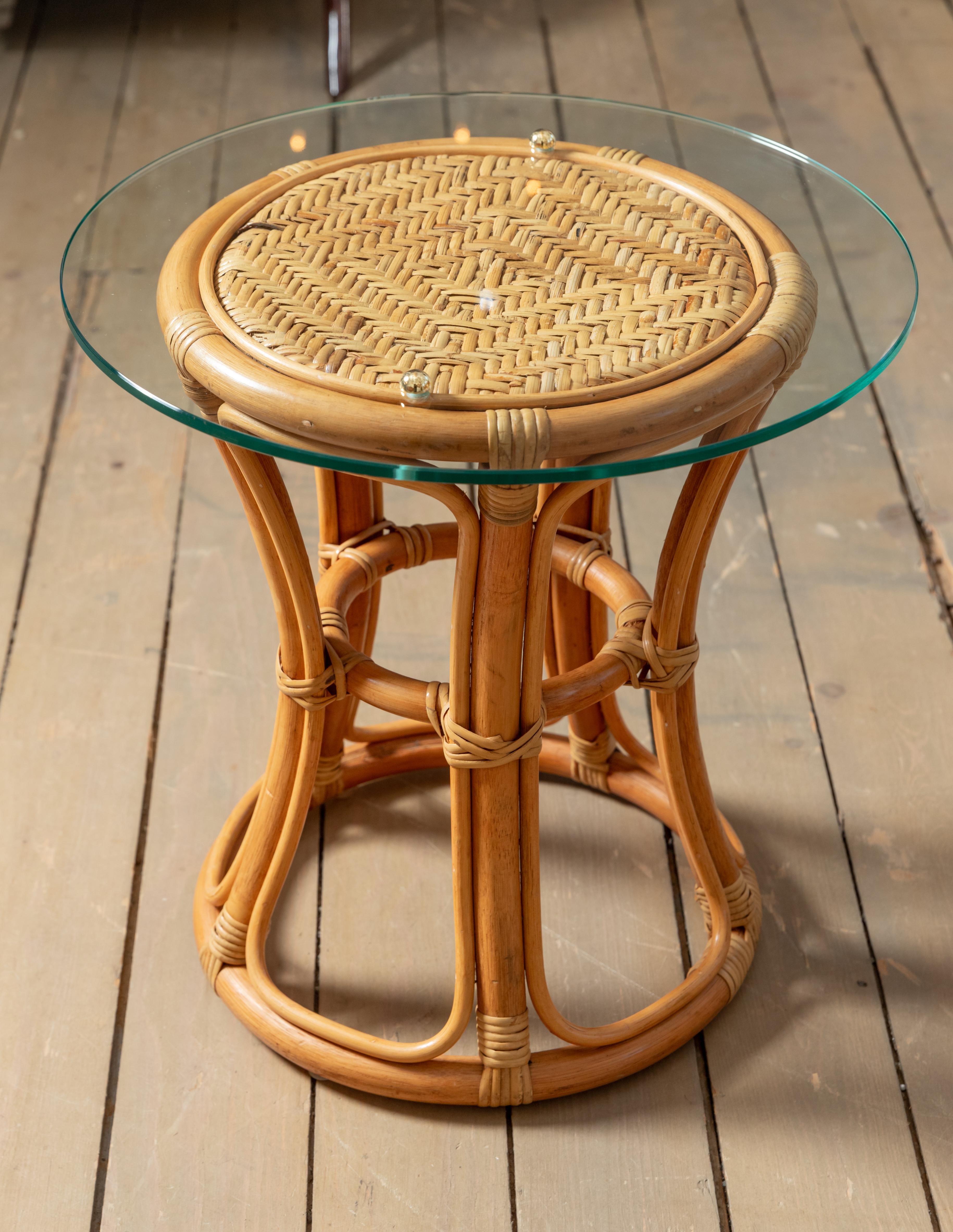 Italian Pair of Glass Top Rattan and Woven Wicker Tables with Brass Details For Sale