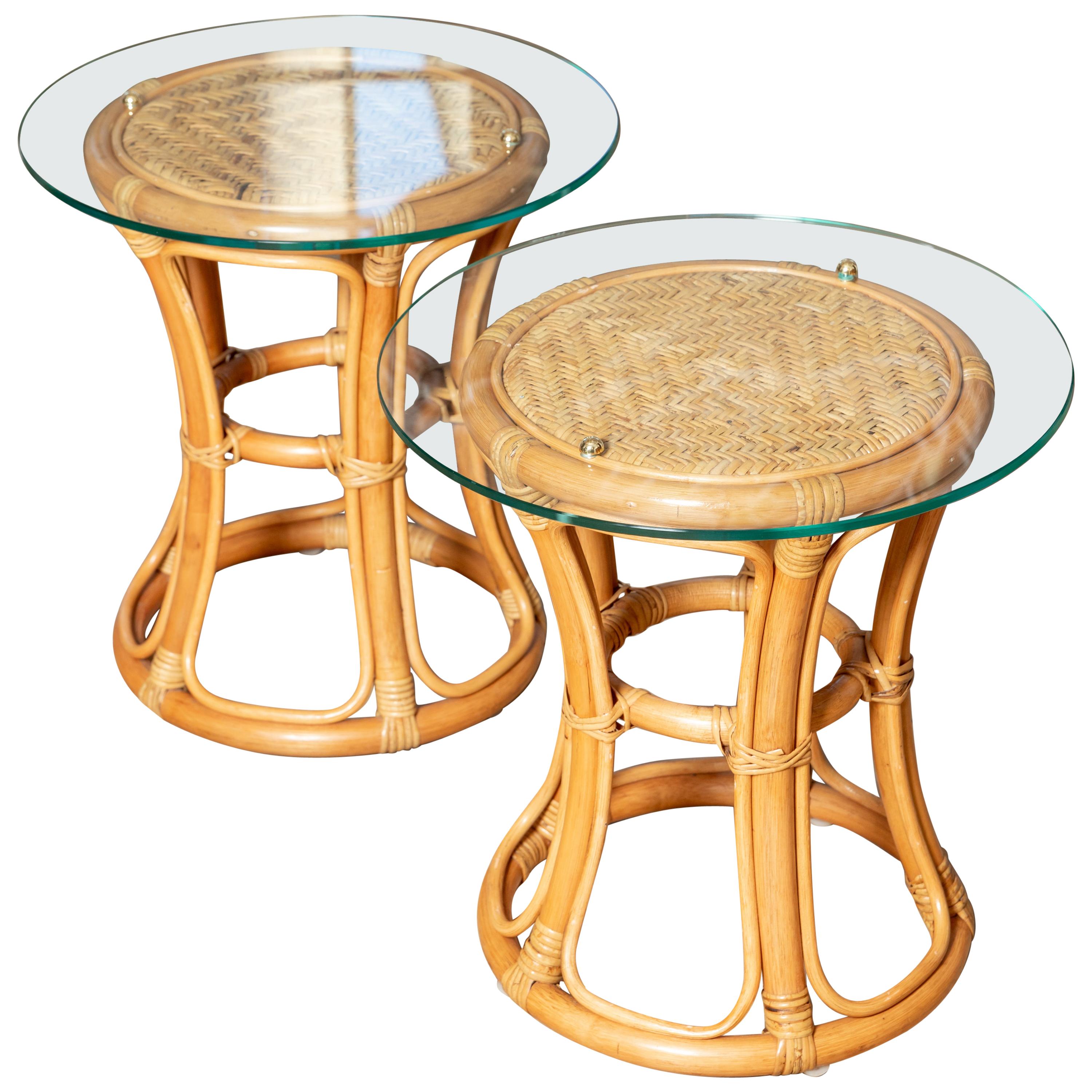 Pair of Glass Top Rattan and Woven Wicker Tables with Brass Details For Sale