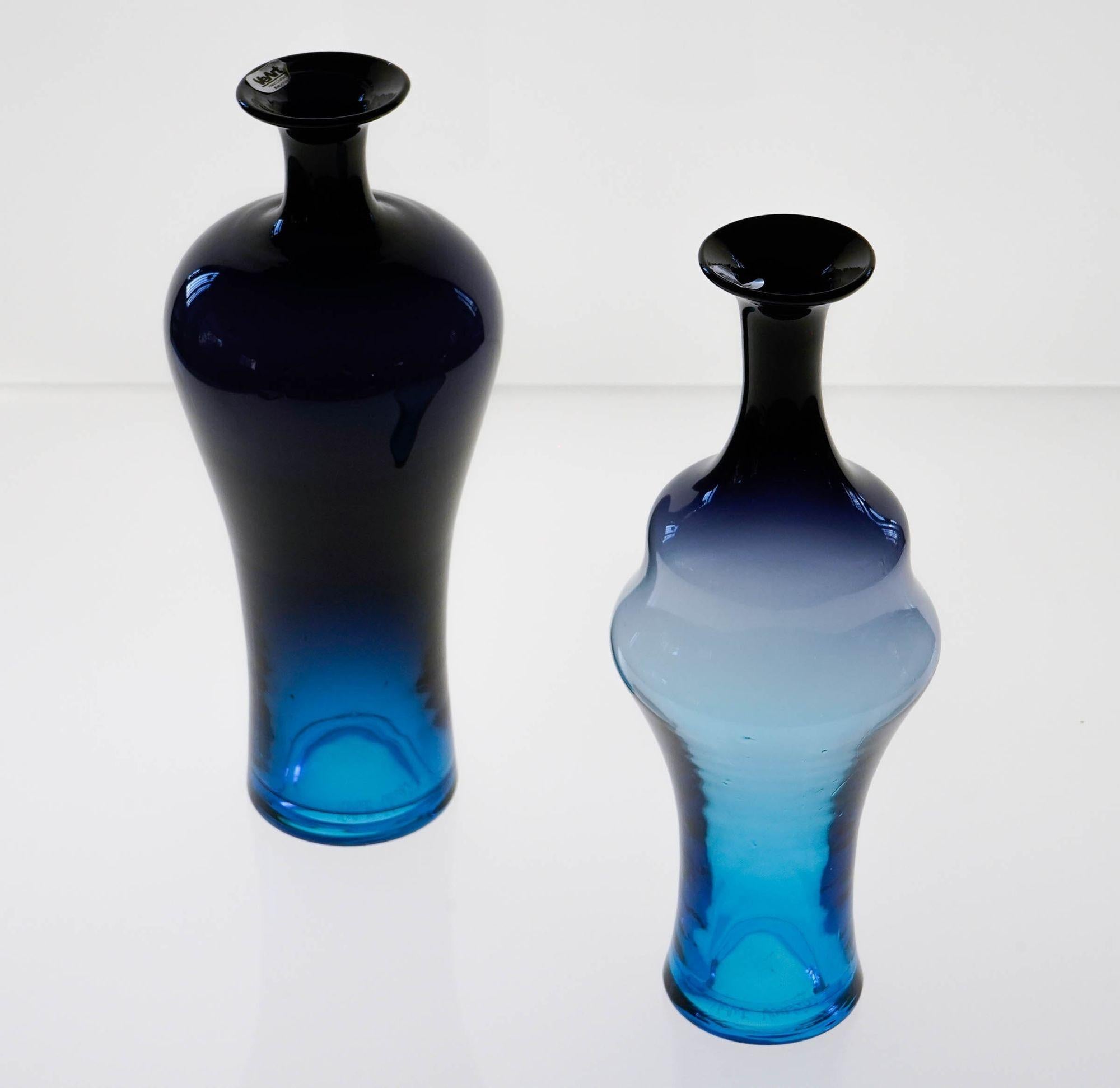 Enchanting set of vases from VeArt.
VeArt was a sister company of Venini set on the mainland, working from the middle of the 60ies to the early 90s. Shared the same designers of Venini, was specialized in blown pieces. 
It has a very well executed