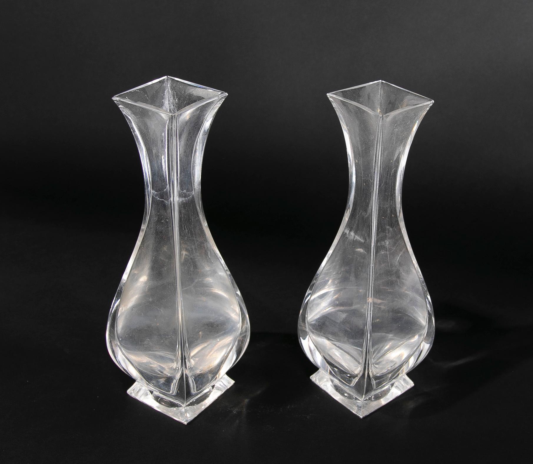 Pair of Glass Vases with a Curved Shape and Square Mouth.