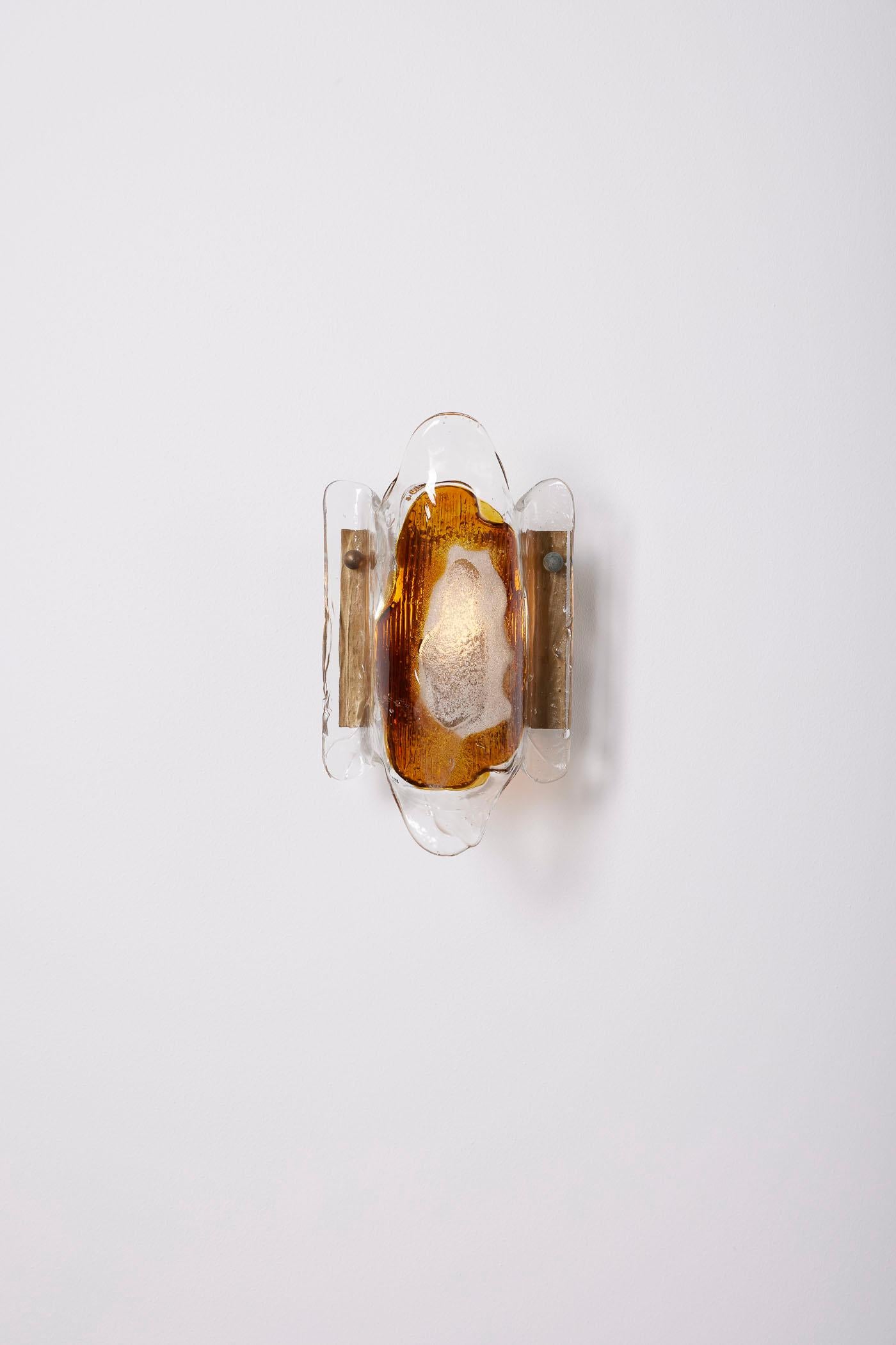 Wall sconce by Danish designer Svend Aage Holm Sørensen (1913-2004), from the 1950s. The diffuser is made of transparent glass with a geometric orange pattern in the center. The structure is in golden brass. Very good condition.

LP1991-2008