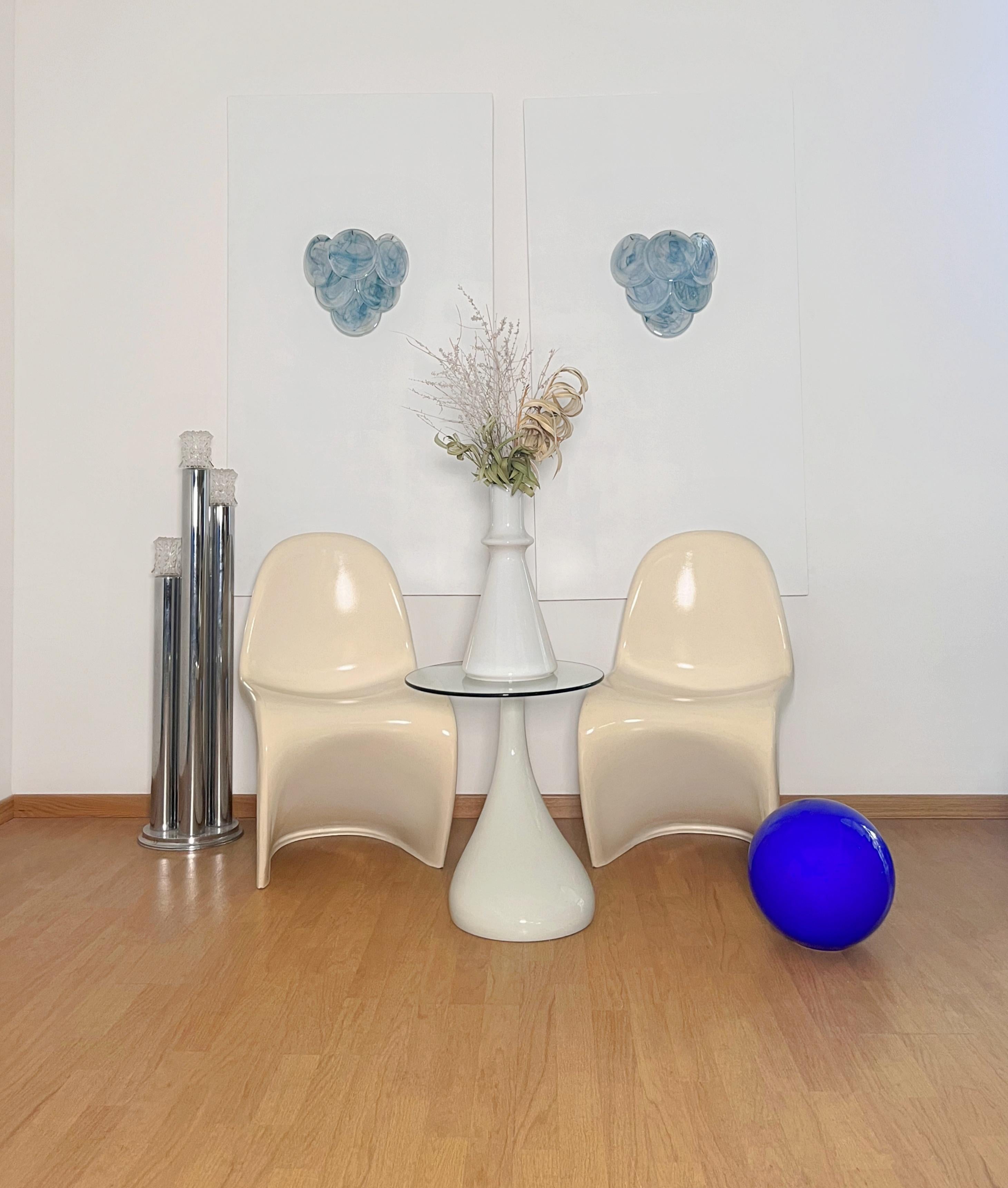 Pair of Vintage Italian Murano appliques in Vistosi style. Wall lights have 6 glass for each, blue alabaster glasses. Nickel metal frame.
Period: 	late XX century
Dimensions: 11,80 inches (30 cm) height; 11,80 inches (30 cm) width; 6,20 inches (16