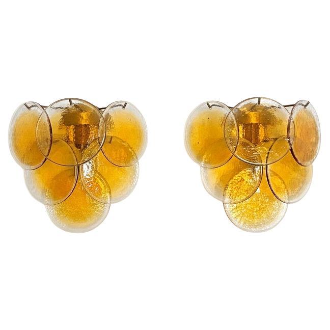 Pair of glass wall sconces - 6 alabaster gold disks in vendita