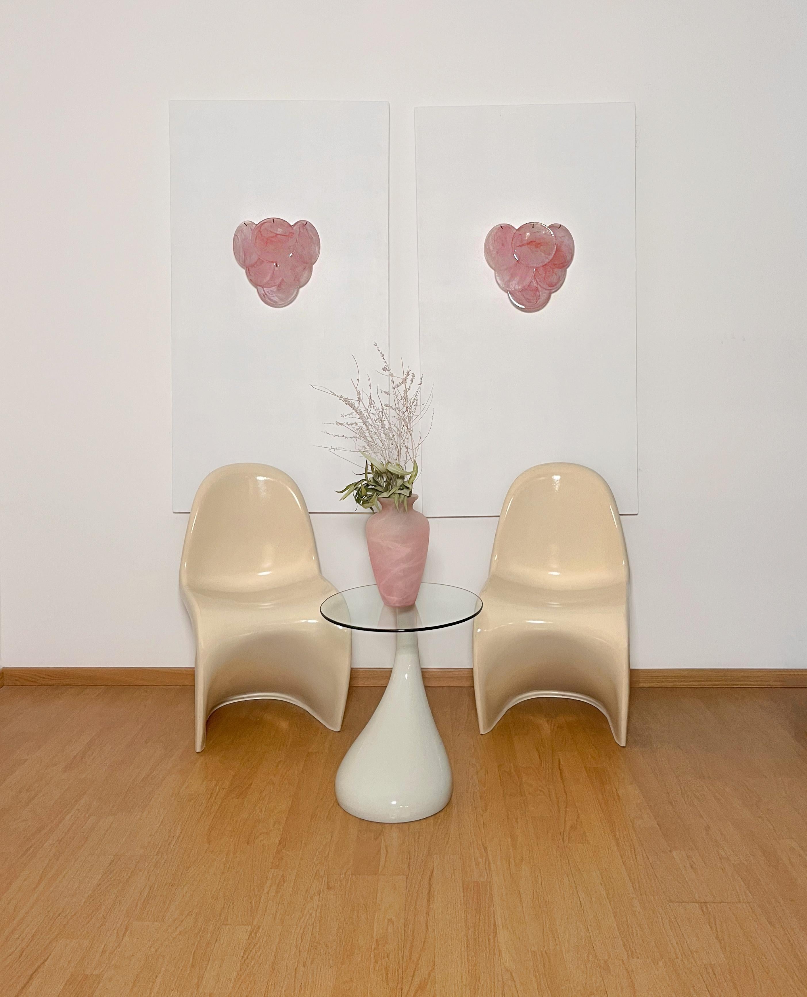 Pair of Vintage Italian Murano appliques in Vistosi style. Wall lights have 6 glass for each, pink alabaster glasses. Nickel metal frame.
Period: 	late XX century
Dimensions: 11,80 inches (30 cm) height; 11,80 inches (30 cm) width; 6,20 inches (16