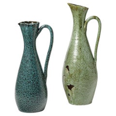 Pair of glazed ceramic pitchers by Accolay, circa 1960-1970.