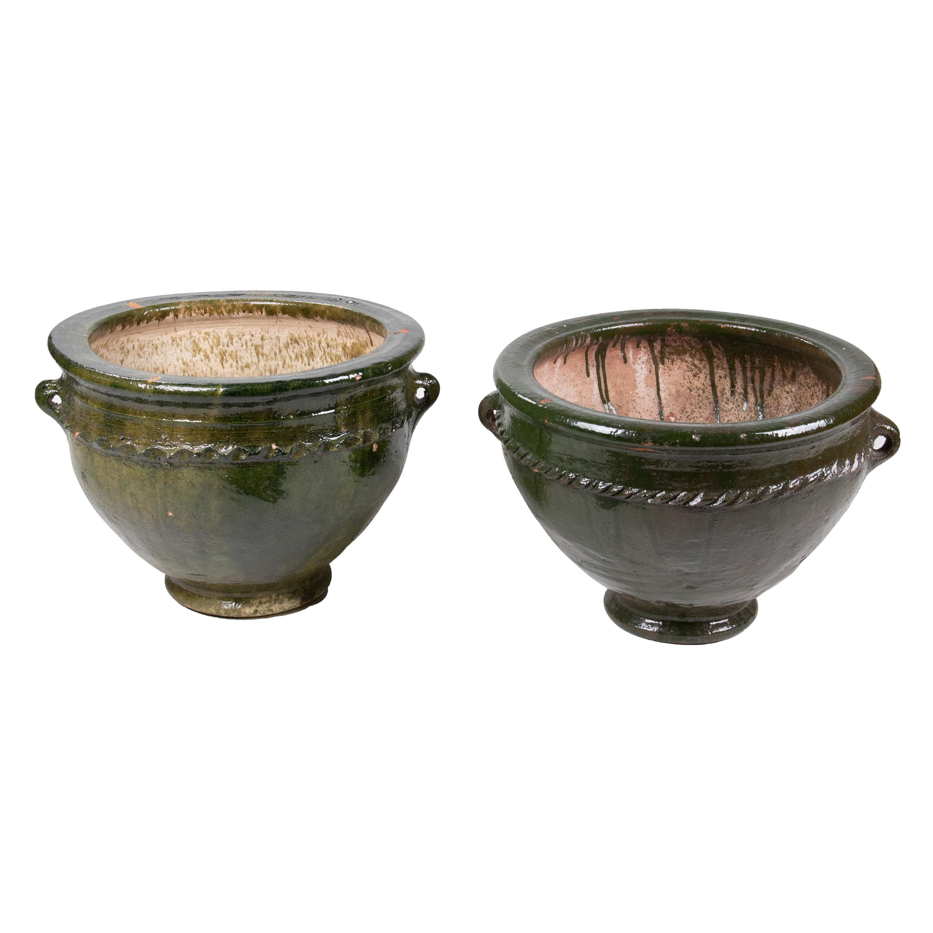Pair of Glazed Green Ceramic Pots