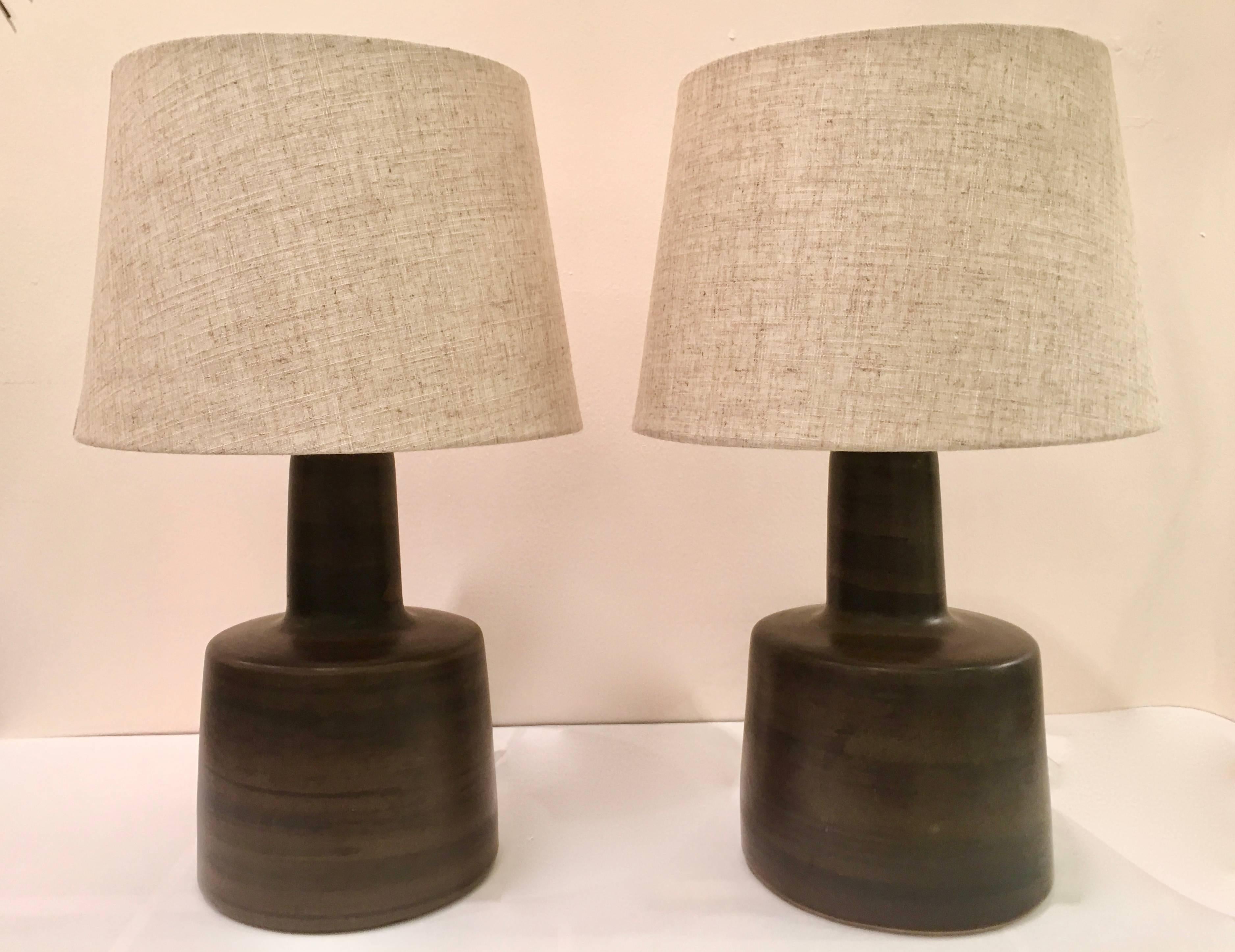 Handsome pair of Martz lamps finished in an attractive glaze with subtle patterns. The lamps are in a versatile small-scale. Please contact for location.  