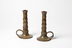 Pair of glazed stoneware candlesticks by Jacques Lacheny, circa 1980.
