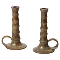 Pair of glazed stoneware candlesticks by Jacques Lacheny, circa 1980.