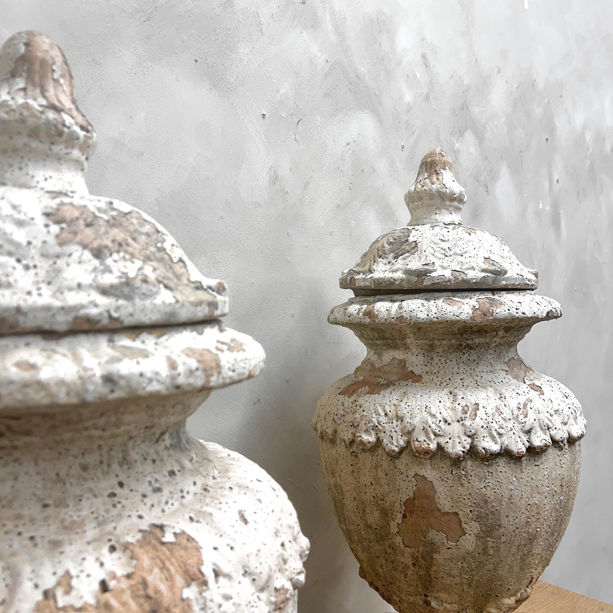 Pair of Glazed Terracotta Lidded Urns 1
