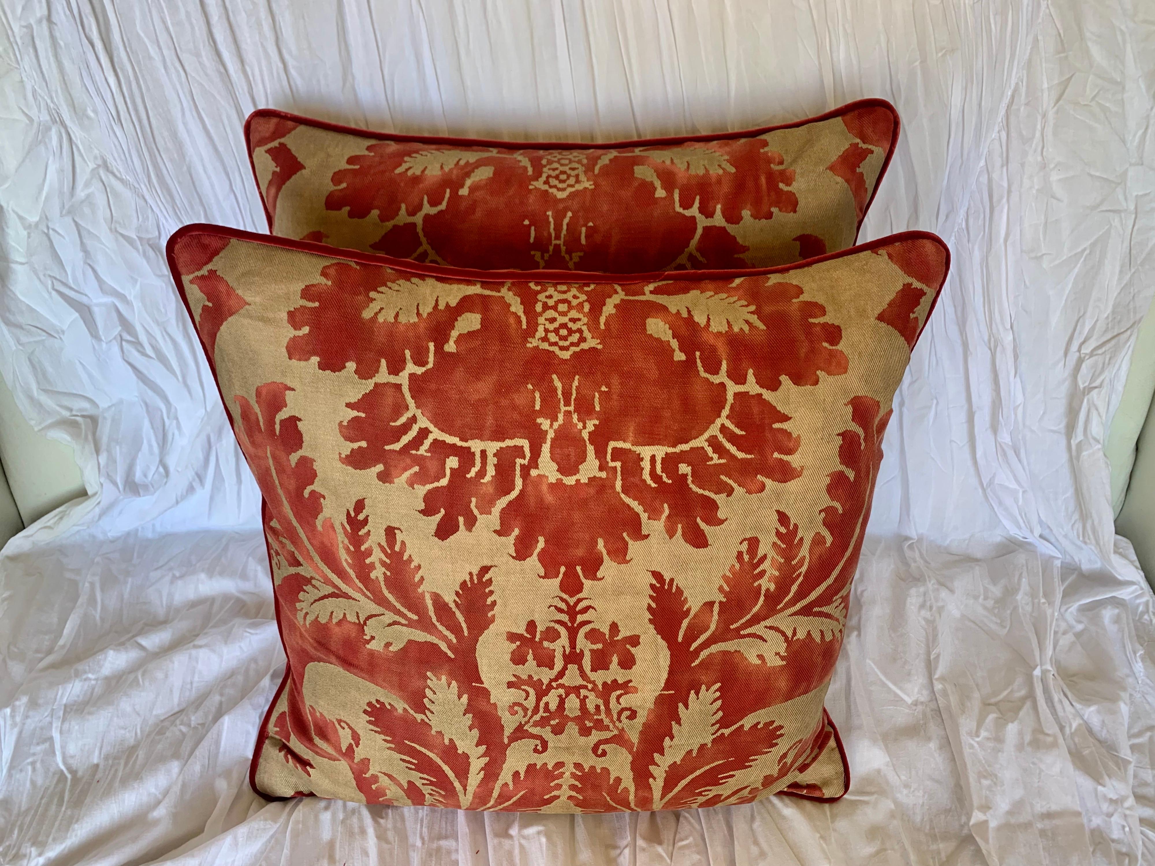 Pair of custom pillows made with authentic vintage red & gold Fortuny fronts combined with red velvet backs. Self cording. Down inserts, sewn closed.