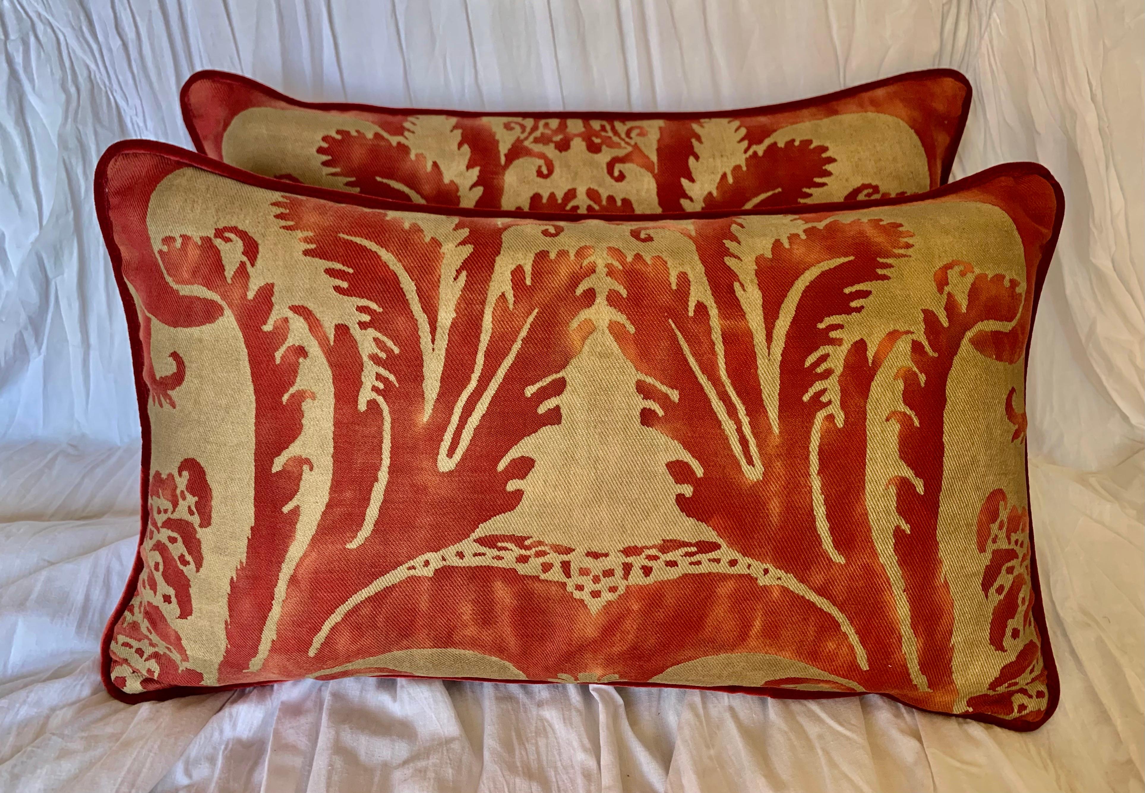 Pair of red & gold custom Glicine patterned Fortuny cotton fronts and red velvet backs. Self cord detail. Down inserts.