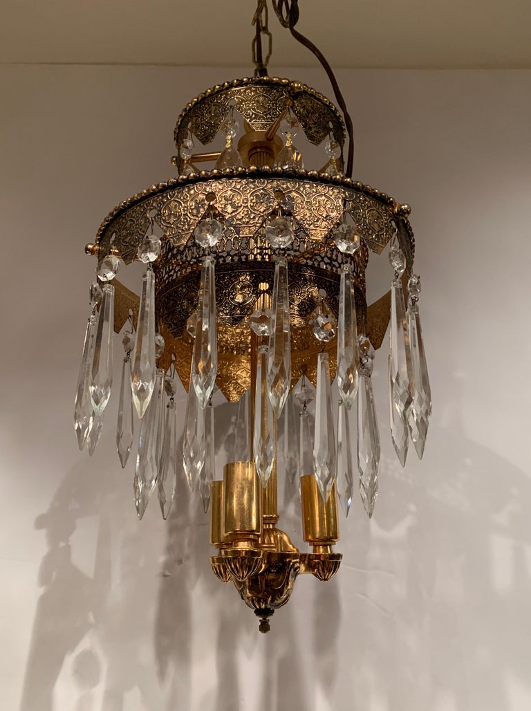 Pair of Glitzy Etched Metal and Crystal Pendant Chandeliers For Sale at