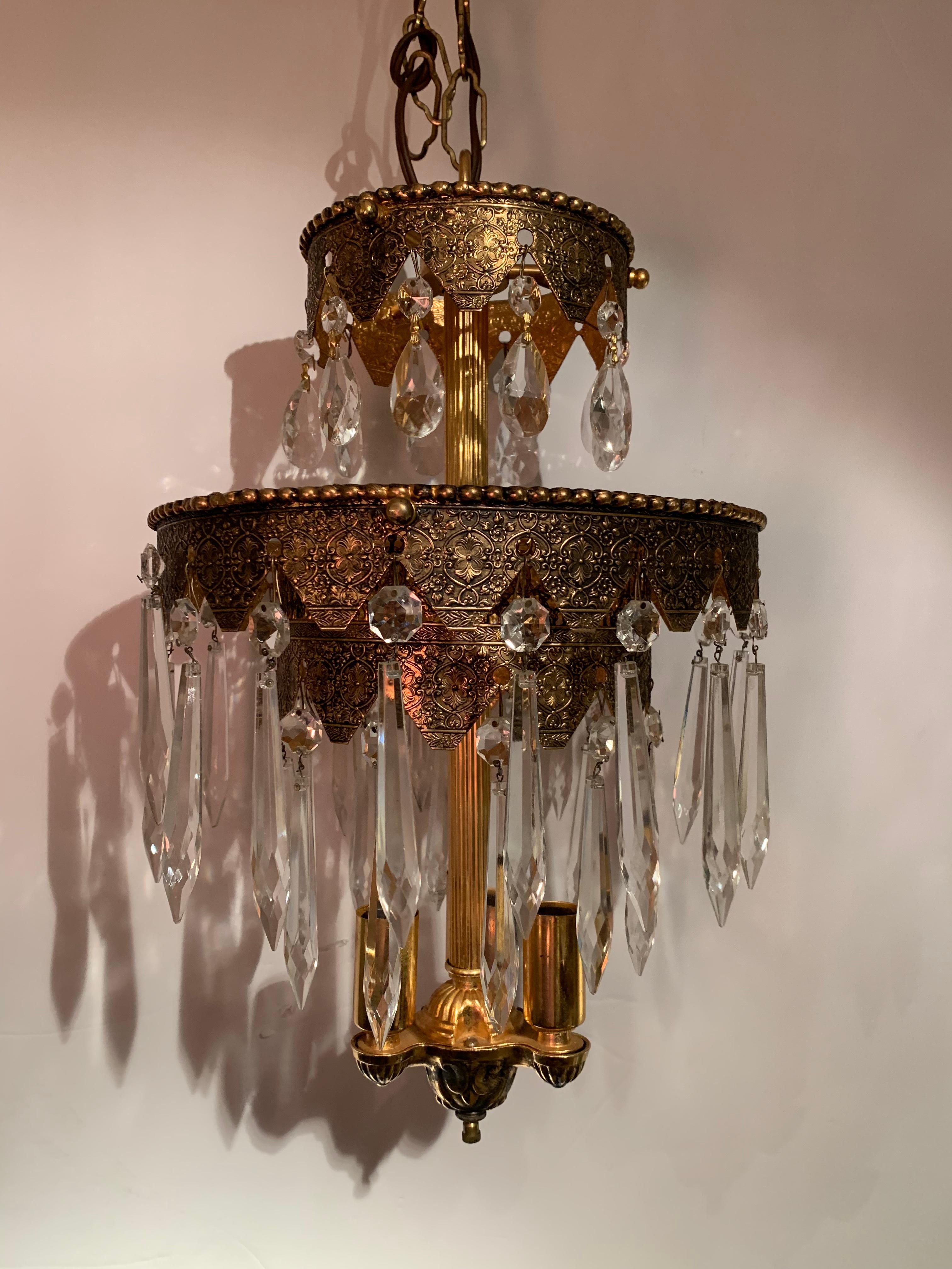 Mid-20th Century Pair of Glitzy Etched Metal and Crystal Pendant Chandeliers For Sale