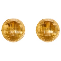 Coppia di appliques "Globes" in vetro di Murano, dello Studio A. Glustin.