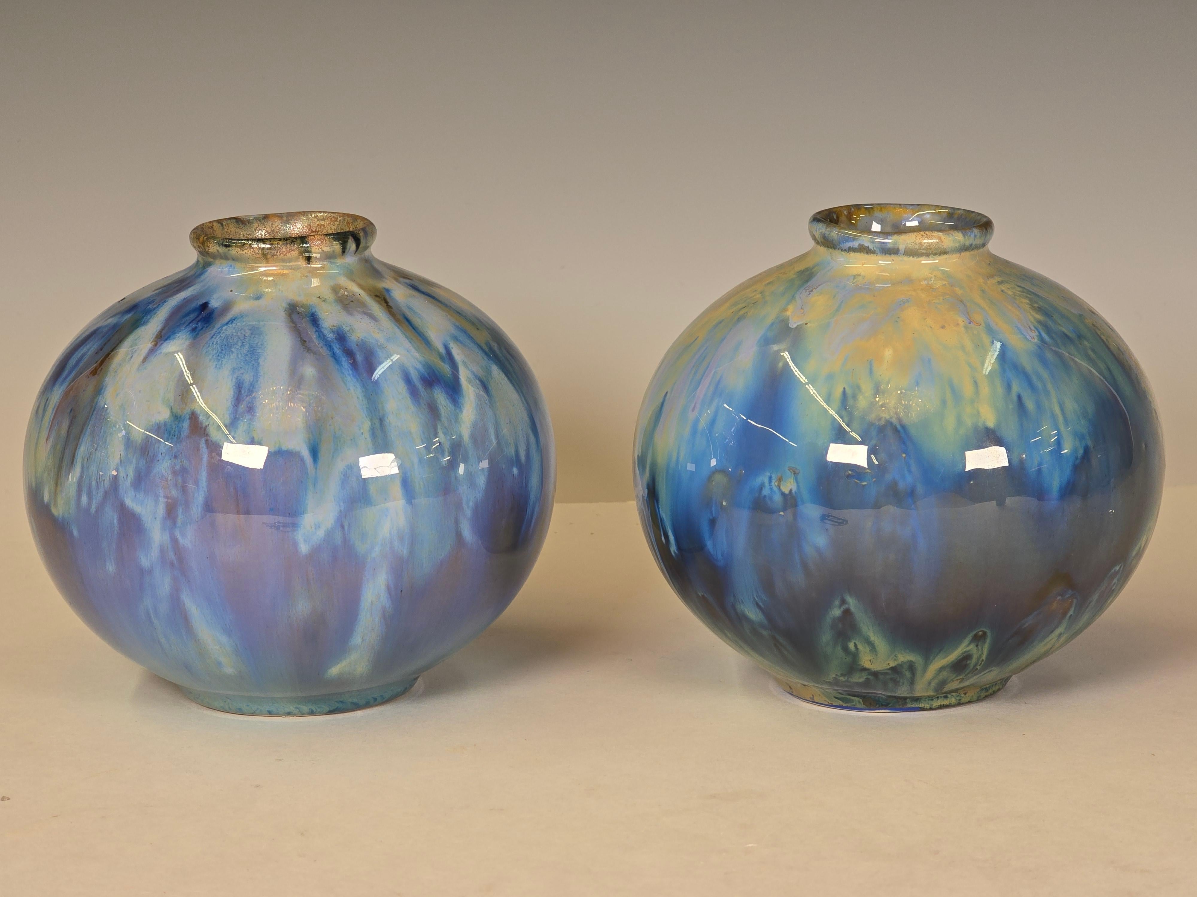 Rare pair of Flambe pots by J. Palin Thorley, hand signed on bottom with sequential numbering. Interesting that these were found at 2 different places over a period of 5 years.  These were test pots to experiment different glaze combinations on and