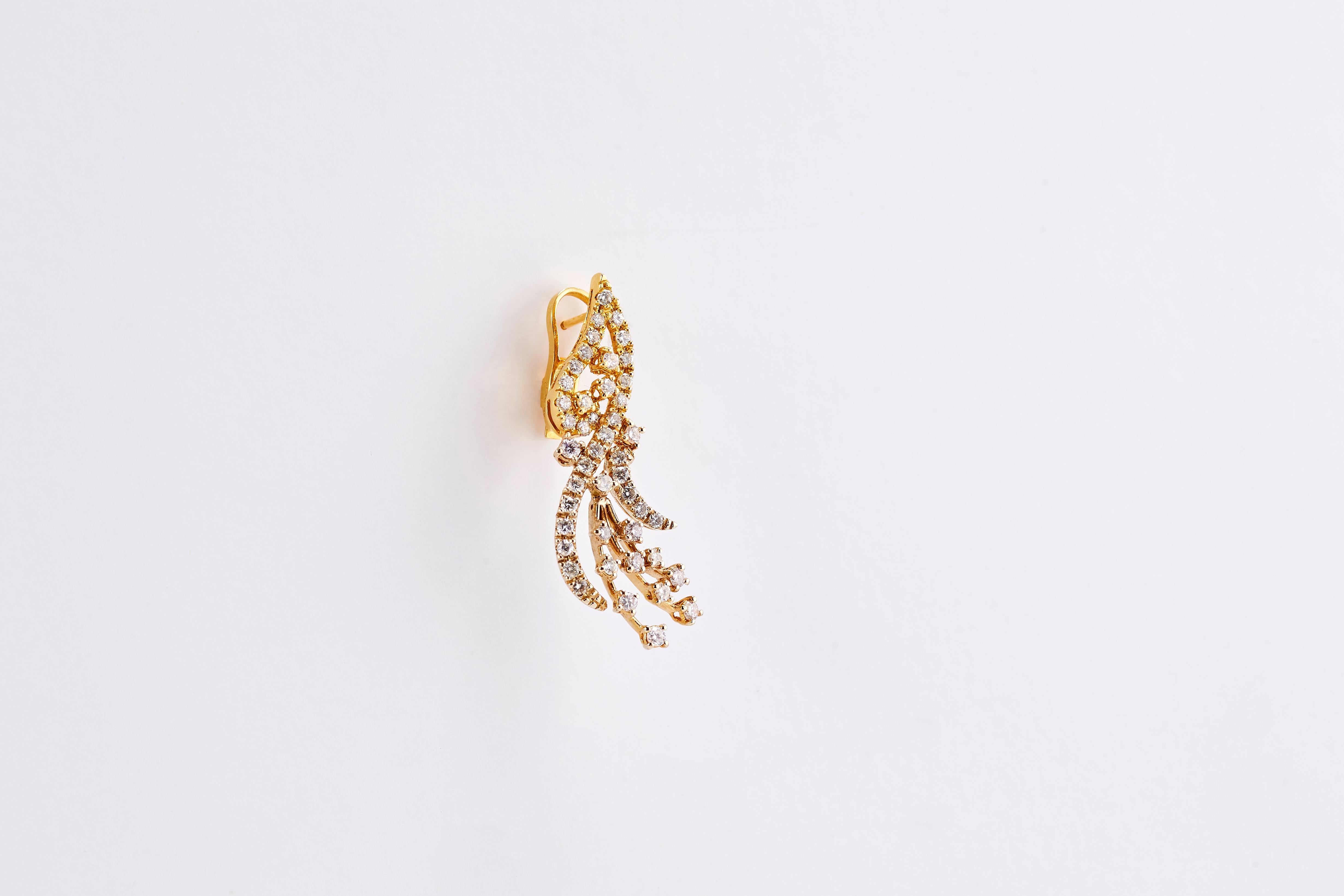 Pair of Glorious 18 Karat Yellow Gold Earrings 

With 2.70 carat of Diamonds
A pair of 18 K yellow gold drop earrings each one looks like a beautiful wing. 
Set with 100 brilliant cut Diamonds total of 2.70 ct G VS1.
Masterfully handcrafted