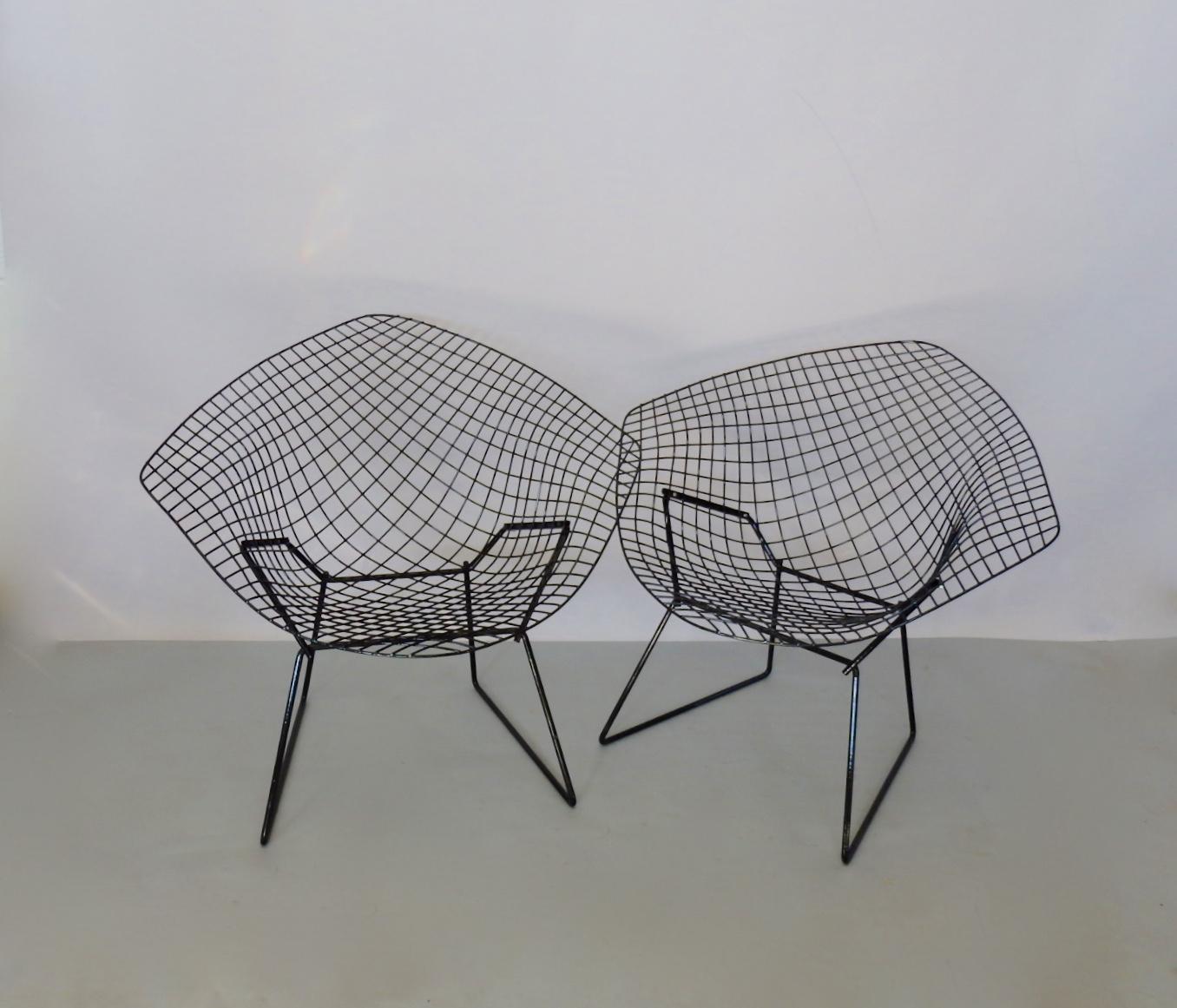 Recently powder coated in gloss black . Pair of Harry Bertoia for Knoll welded steel wire diamond chairs. Ship dis assembled MAY be cheaper . Inquire before purchase .