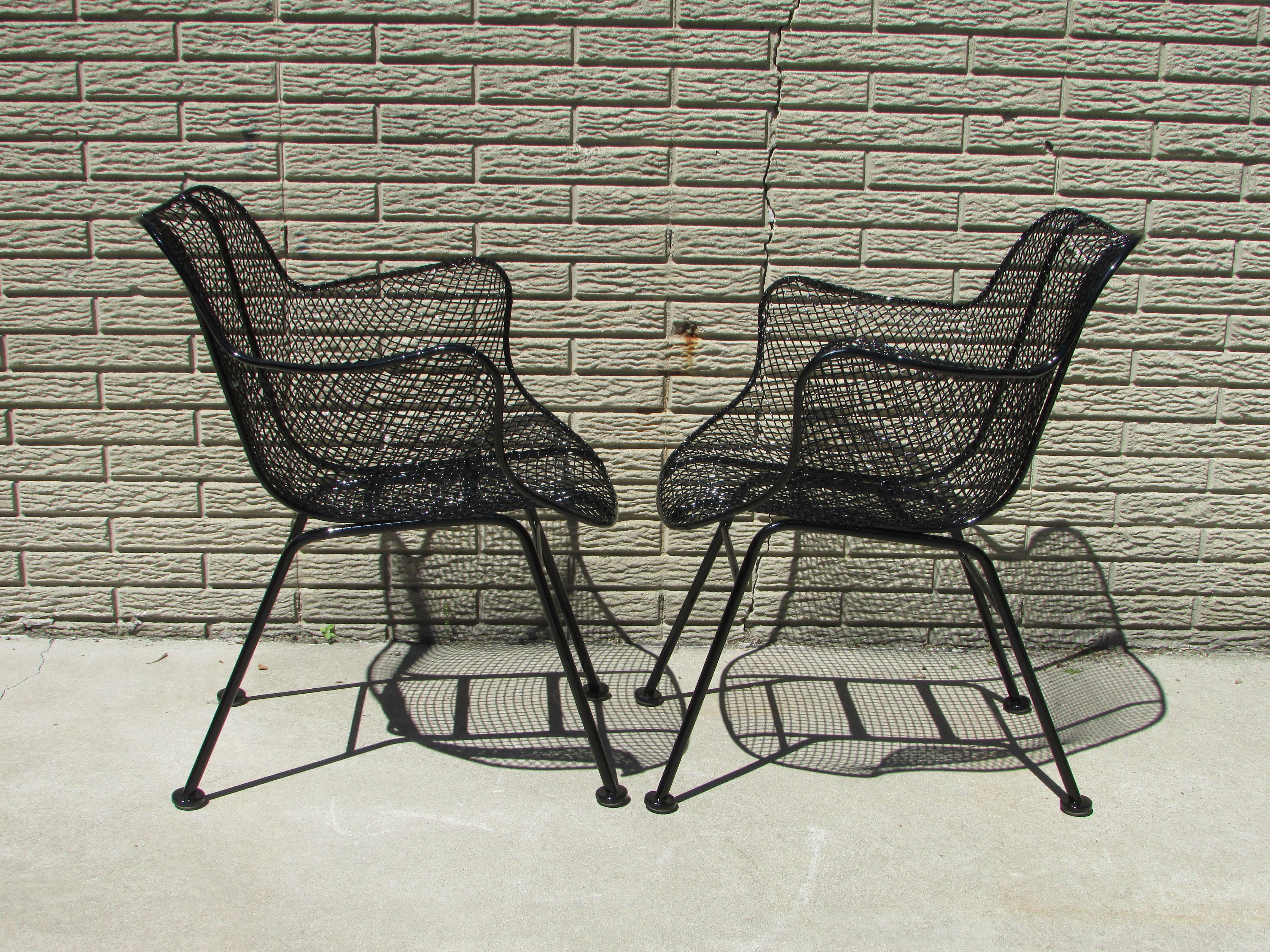 Powder-Coated Pair of Gloss Black Woodard Wrought Iron Frame with Steel Mesh Armchairs For Sale