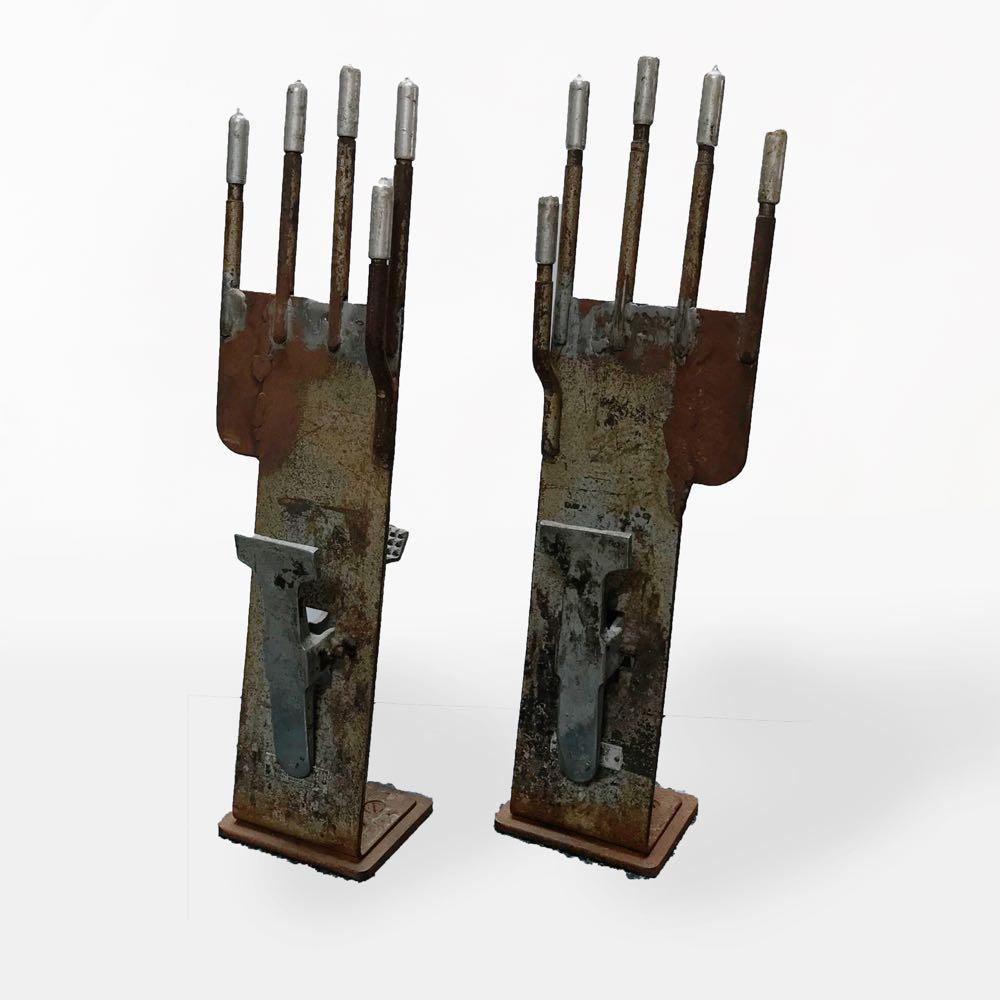A pair of glove molds in metal (sizes may vary). Originating in France, circa 1910.