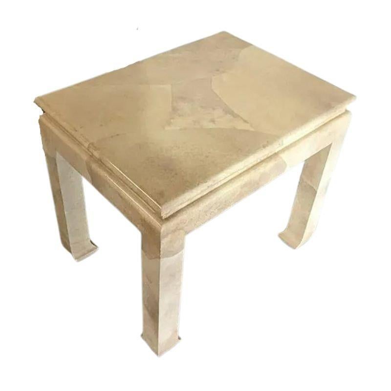 A pair of side tables in Karl Springer, Mid-Century Modern style square shape tables of lacquered goatskin with recessed panel surrounding top and Asian Style hoof feet. The neutral cream color can complement multiple color schemes. Very chic