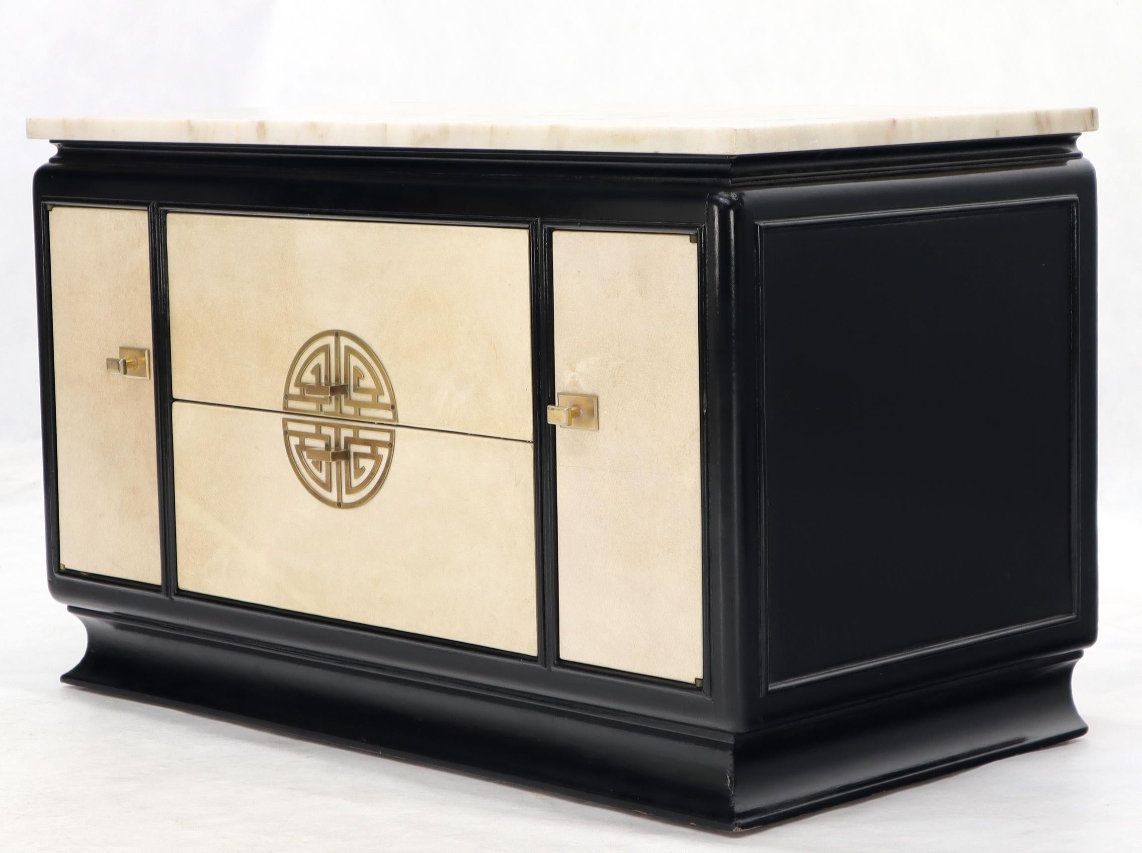 Pair of Italian Mid-Century Modern black lacquer parchment doors and drawers brass hardware marble top end tables or night stands.