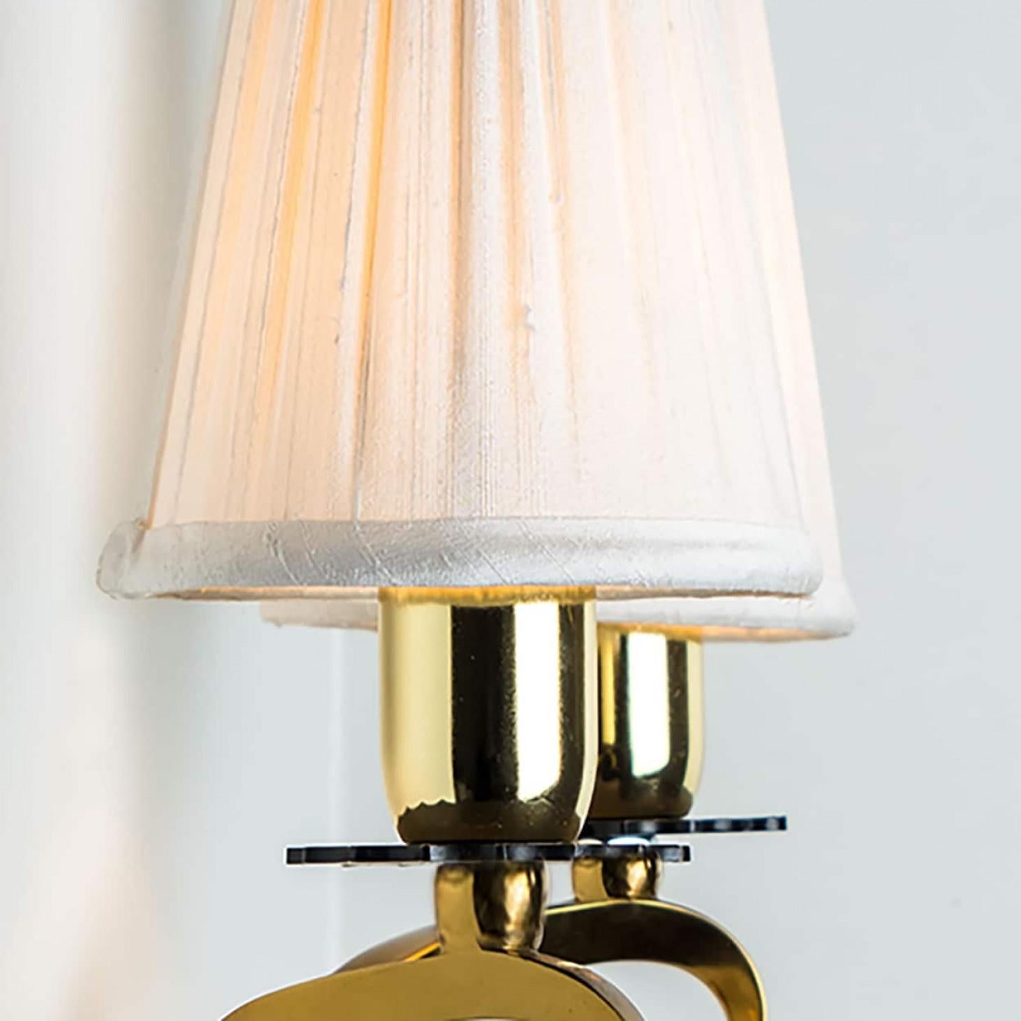 XX secolo Coppia di lampade da parete in oro e ottone, Leleu, 1960 in vendita