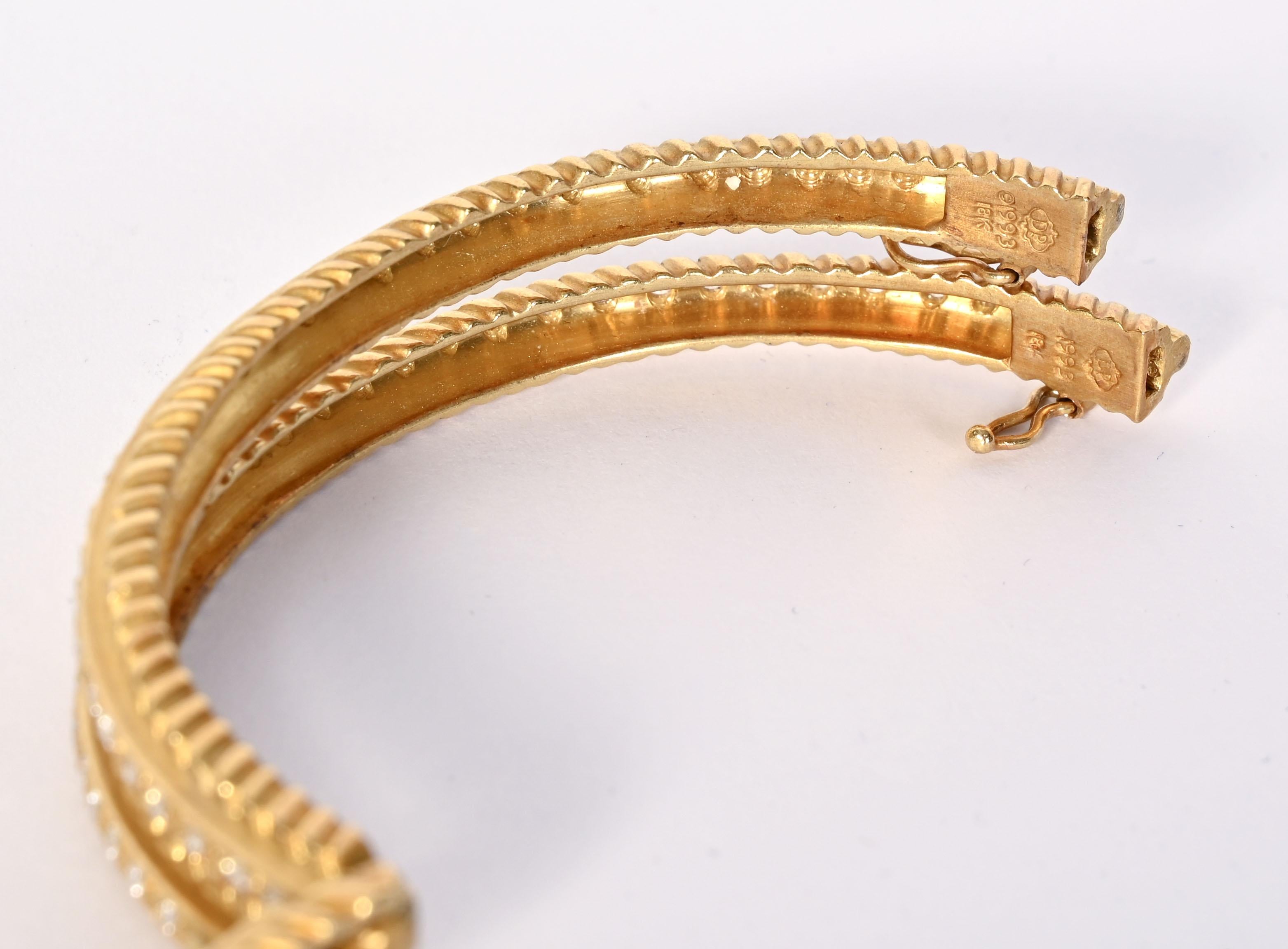 Brilliant Cut Pair of Gold and Diamond Bangle Bracelets by Doris Panos For Sale