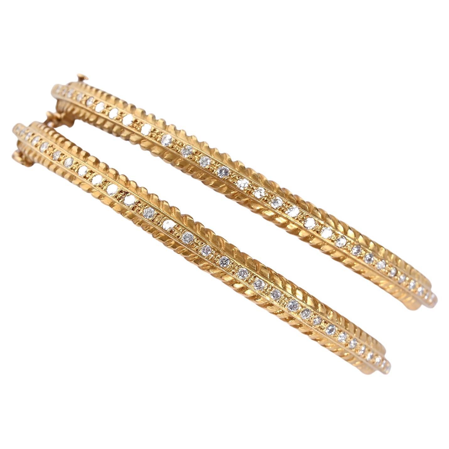 Pair of Gold and Diamond Bangle Bracelets by Doris Panos