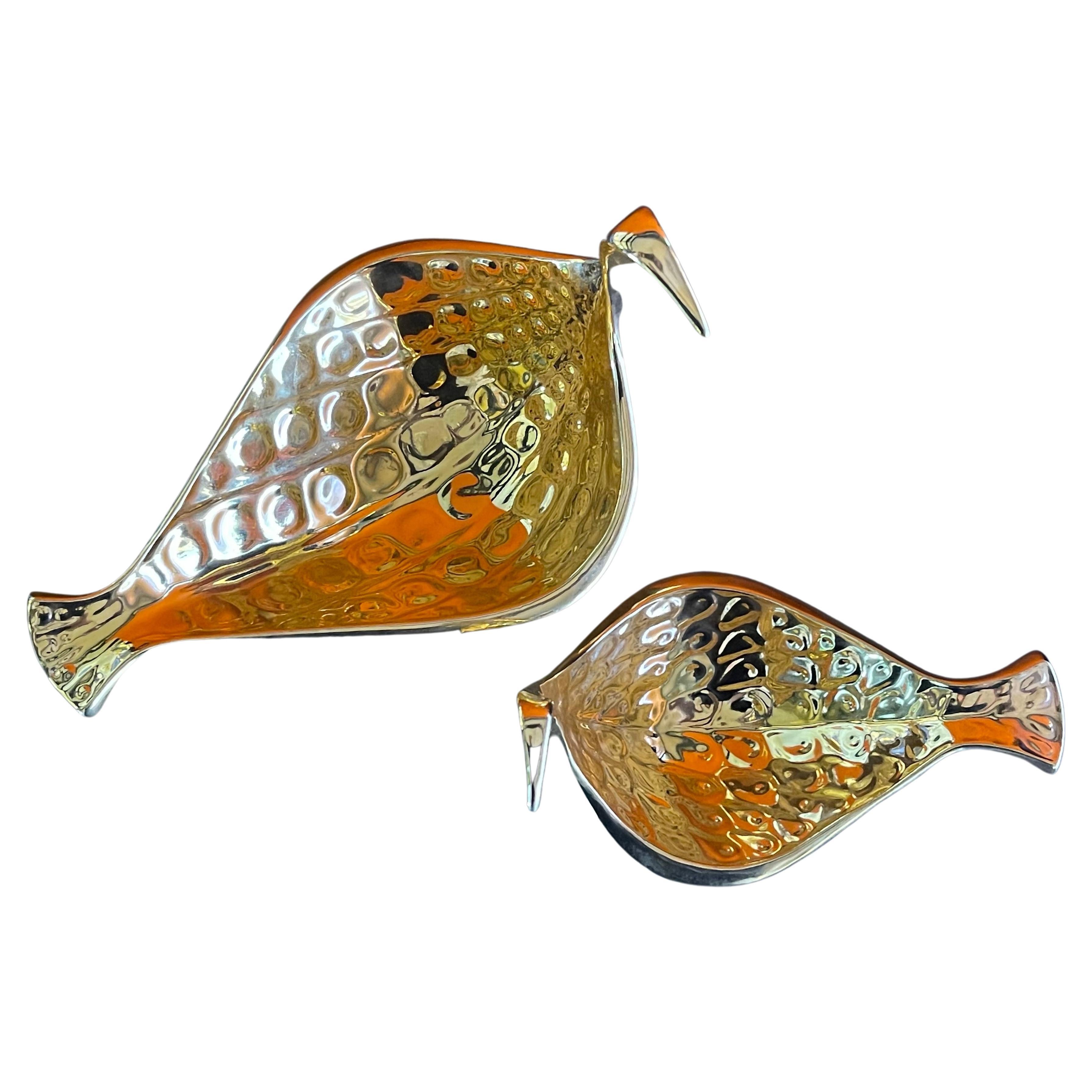 A lovely pair of bright gold ceramic bird bowls from the 