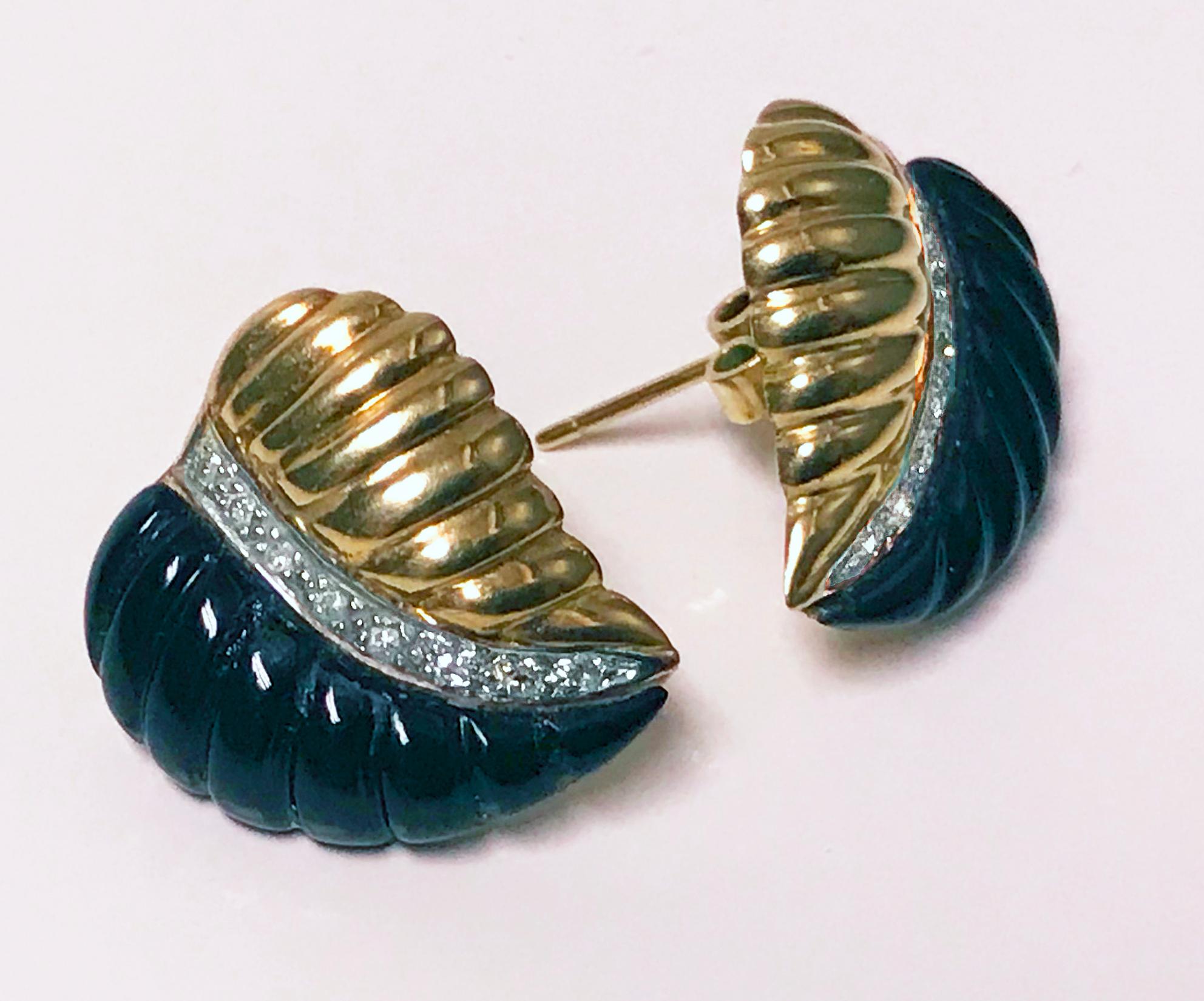 Pair of Diamond Onyx Gold Leaf form Earrings. Each with ribbed black onyx and gold petal divided with a row of pave set small single cut diamonds. Post and butterfly fitments. Reverse stamped 14K. Measure: 19.00 x 17.30 mm. Total Item Weight: 5.20