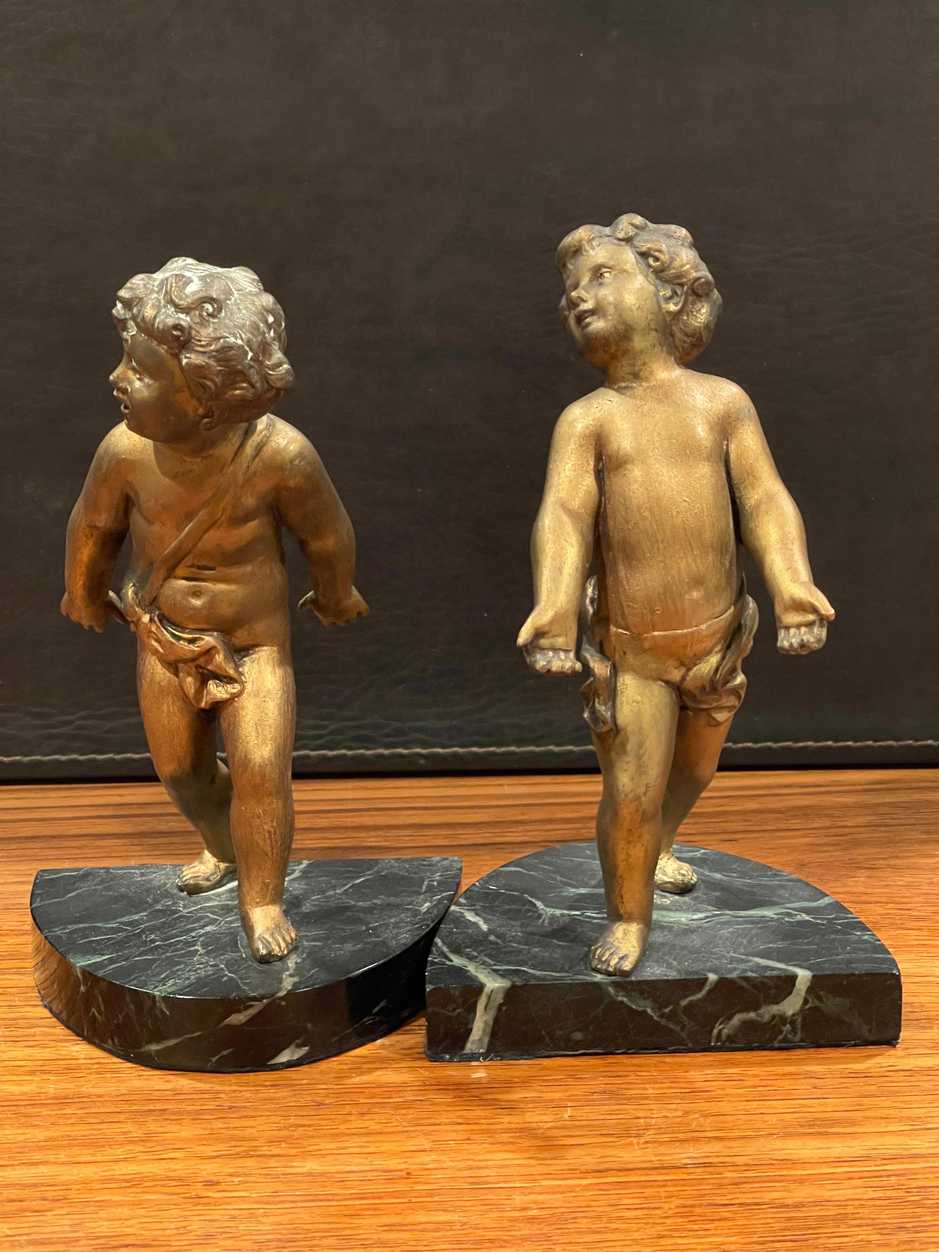 Brass Pair of Gold Gilt Cherubs on Marble French Art Deco Bookends For Sale