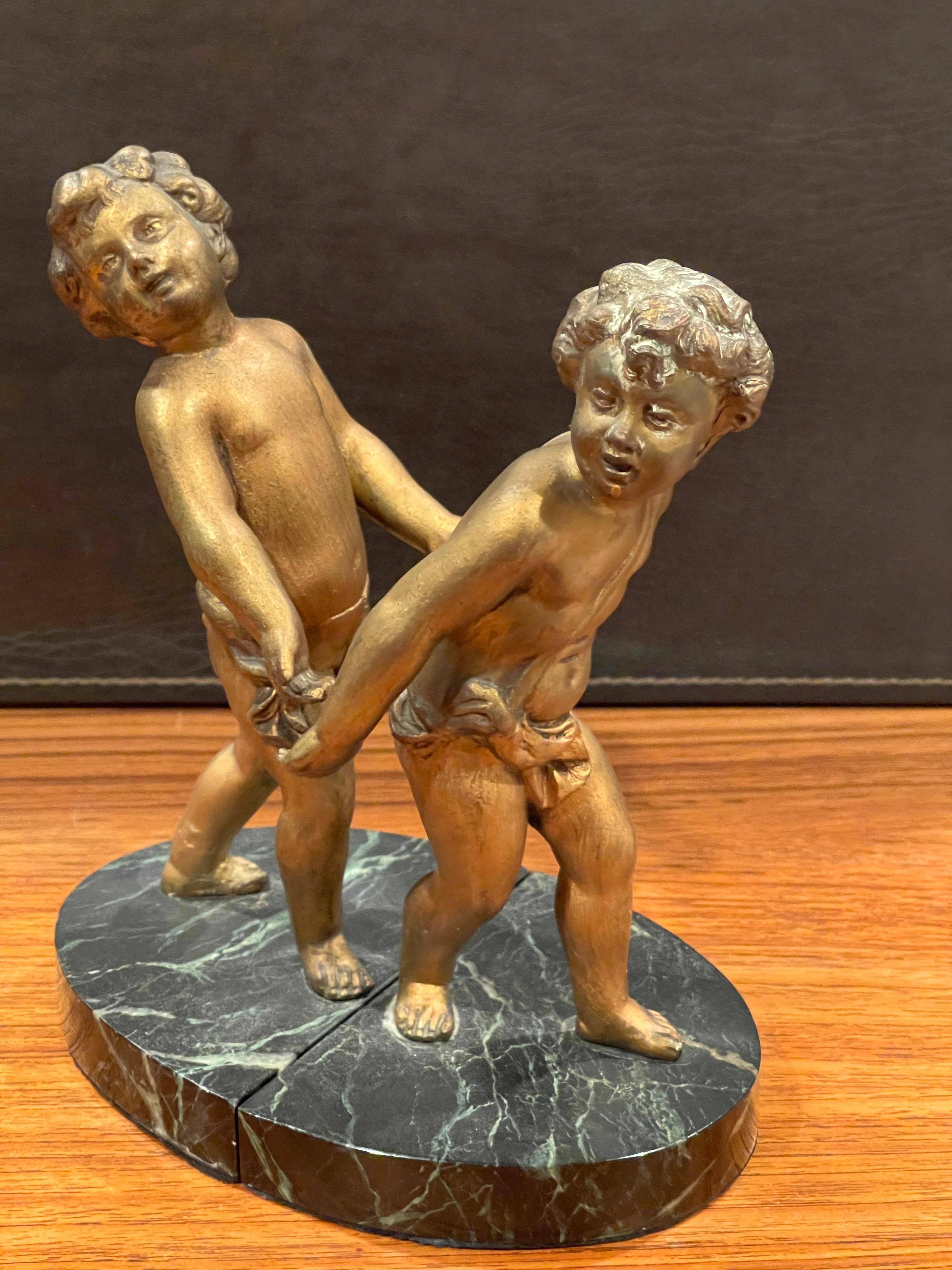 Pair of Gold Gilt Cherubs on Marble French Art Deco Bookends For Sale 3