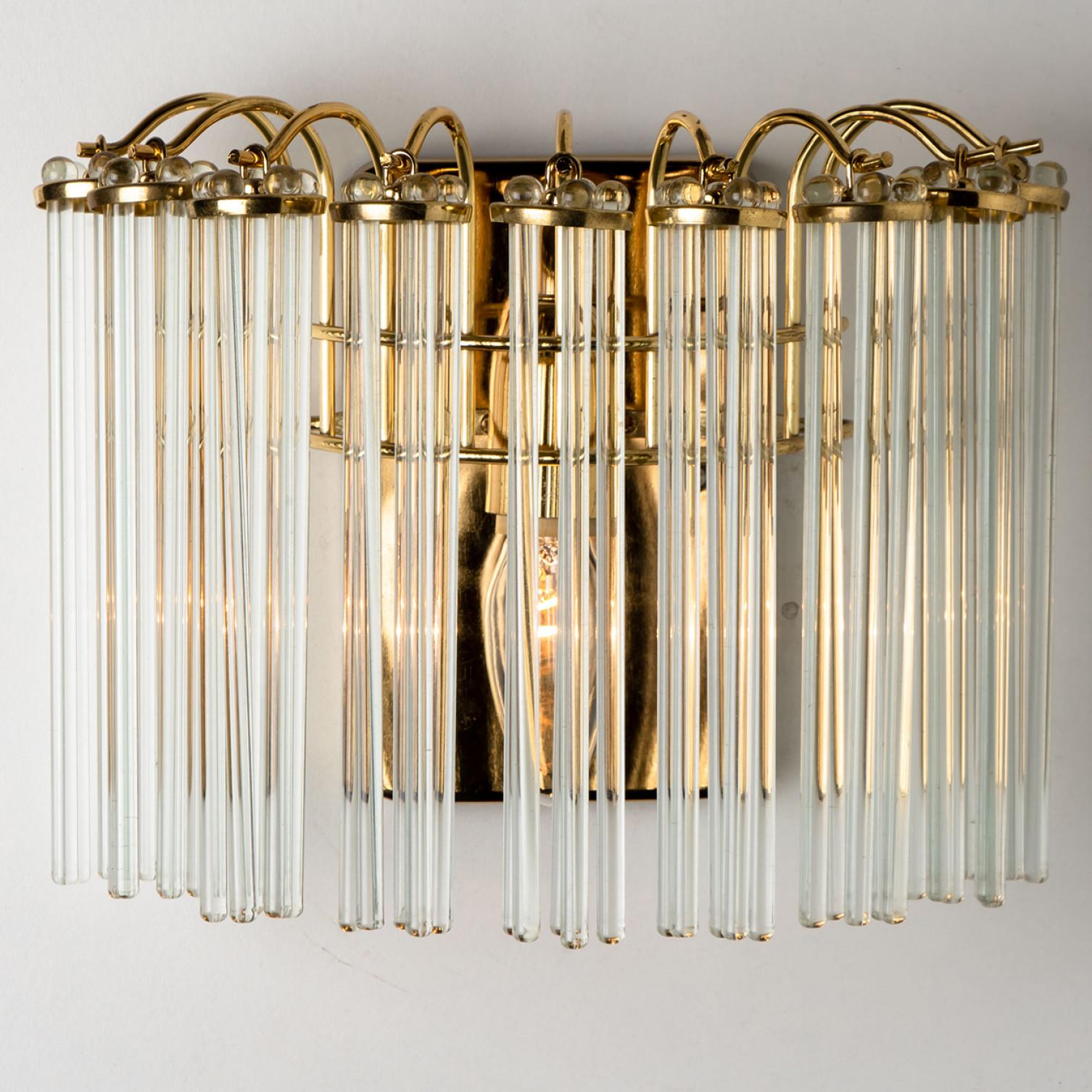 Mid-Century Modern Pair of Gold Hanging Rod Glass and Brass Wall Sconce in Style of Sciolari, 1960 For Sale
