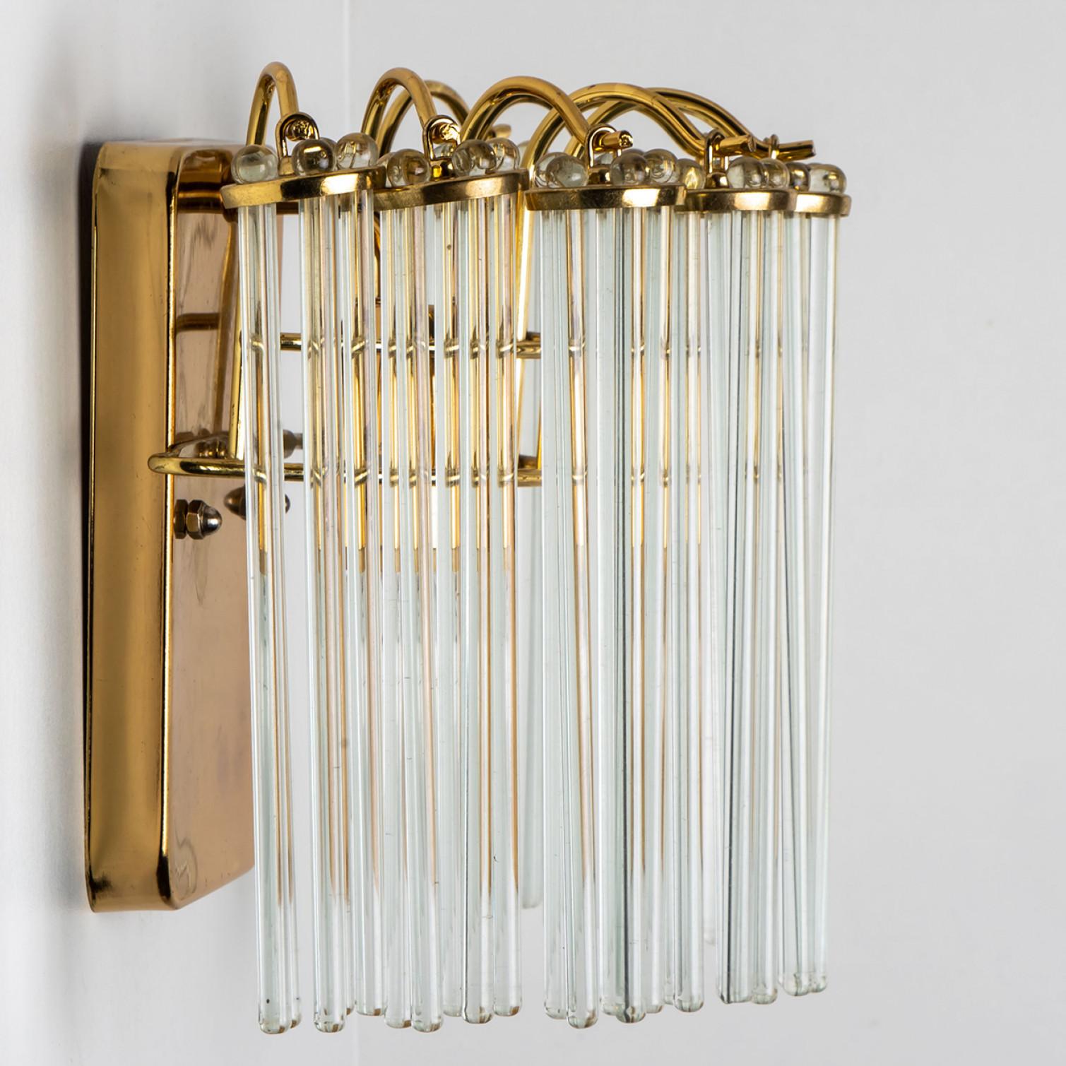 Italian Pair of Gold Hanging Rod Glass and Brass Wall Sconce in Style of Sciolari, 1960 For Sale