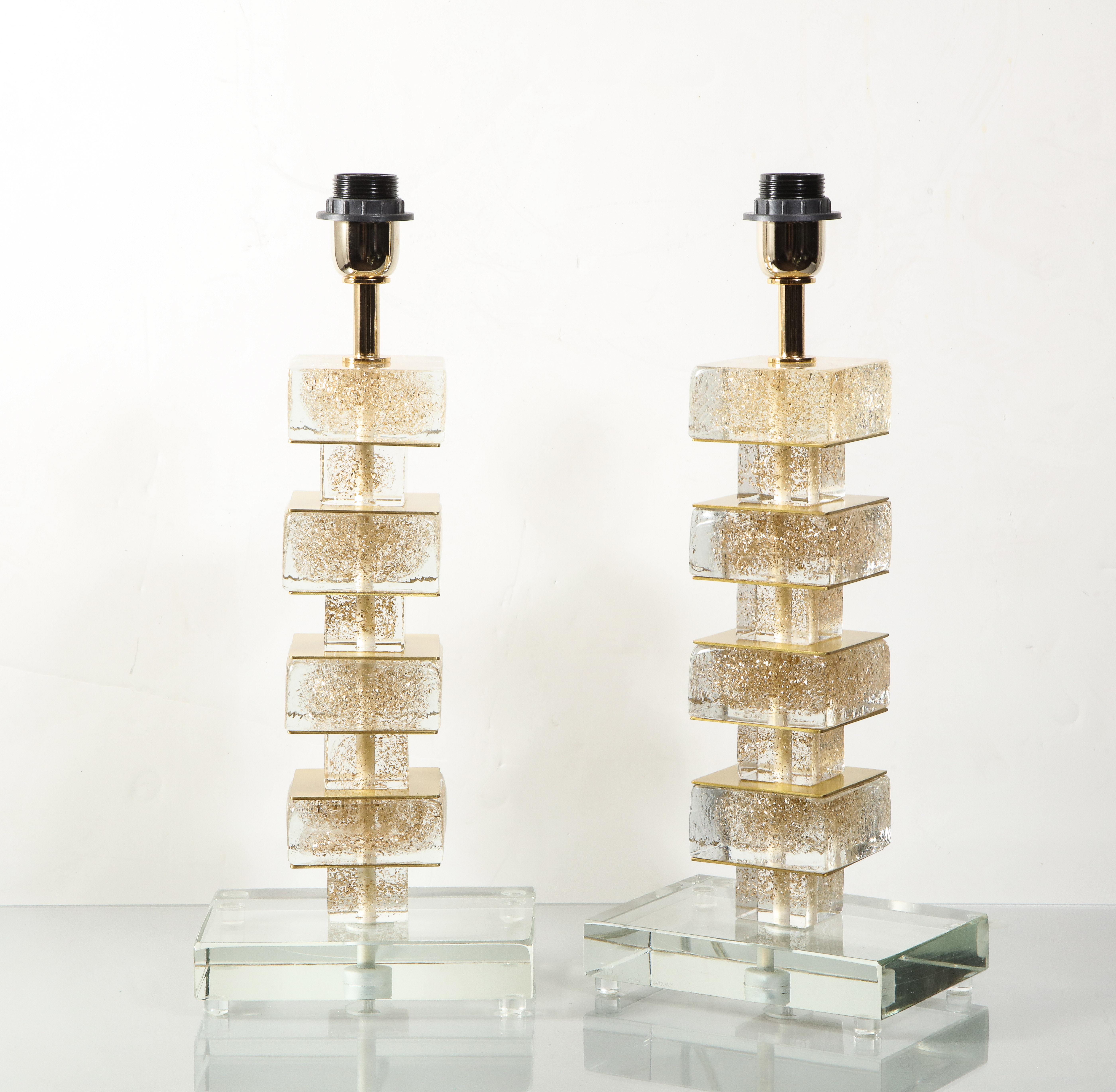 Amazing pair of gold infused Murano glass Cubist table lamps available for custom orders. Each glass block is handmade and speckled with gold flakes which create warm and elegant glitters when the lamp is on. Please inquire Venfield for current