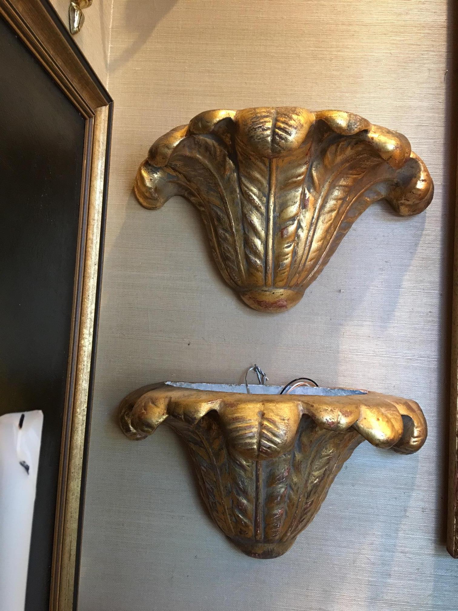 Pair of gold leaf plasters wall sconces, mid-20th century.