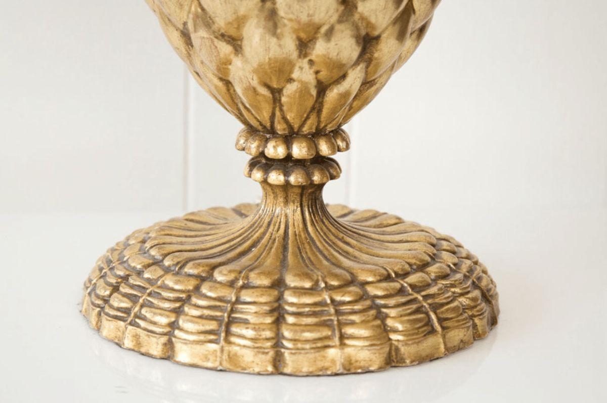 A pair of gold leaf composition lamps in a pineapple shaped design. Height is 19 inches from the base to the top of the socket. The diameter of the base is 8 inches. These lamps were designed by Bryan Cox.