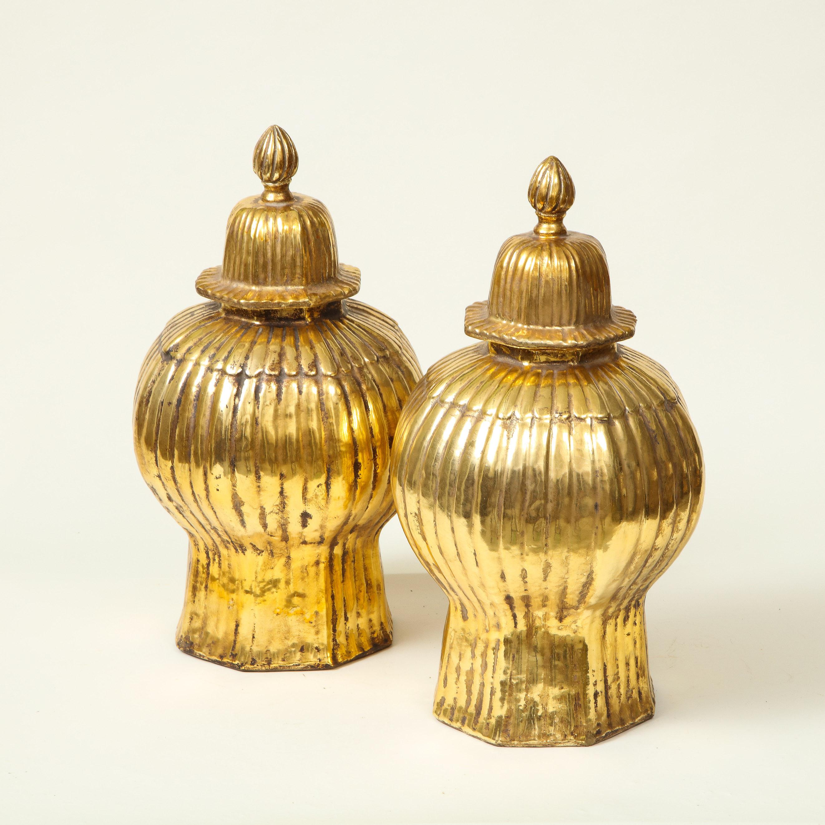 Of baluster form; each lid surmounted by a knop finial.

Provenance: From the Collection of Mario Buatta, New York, NY.