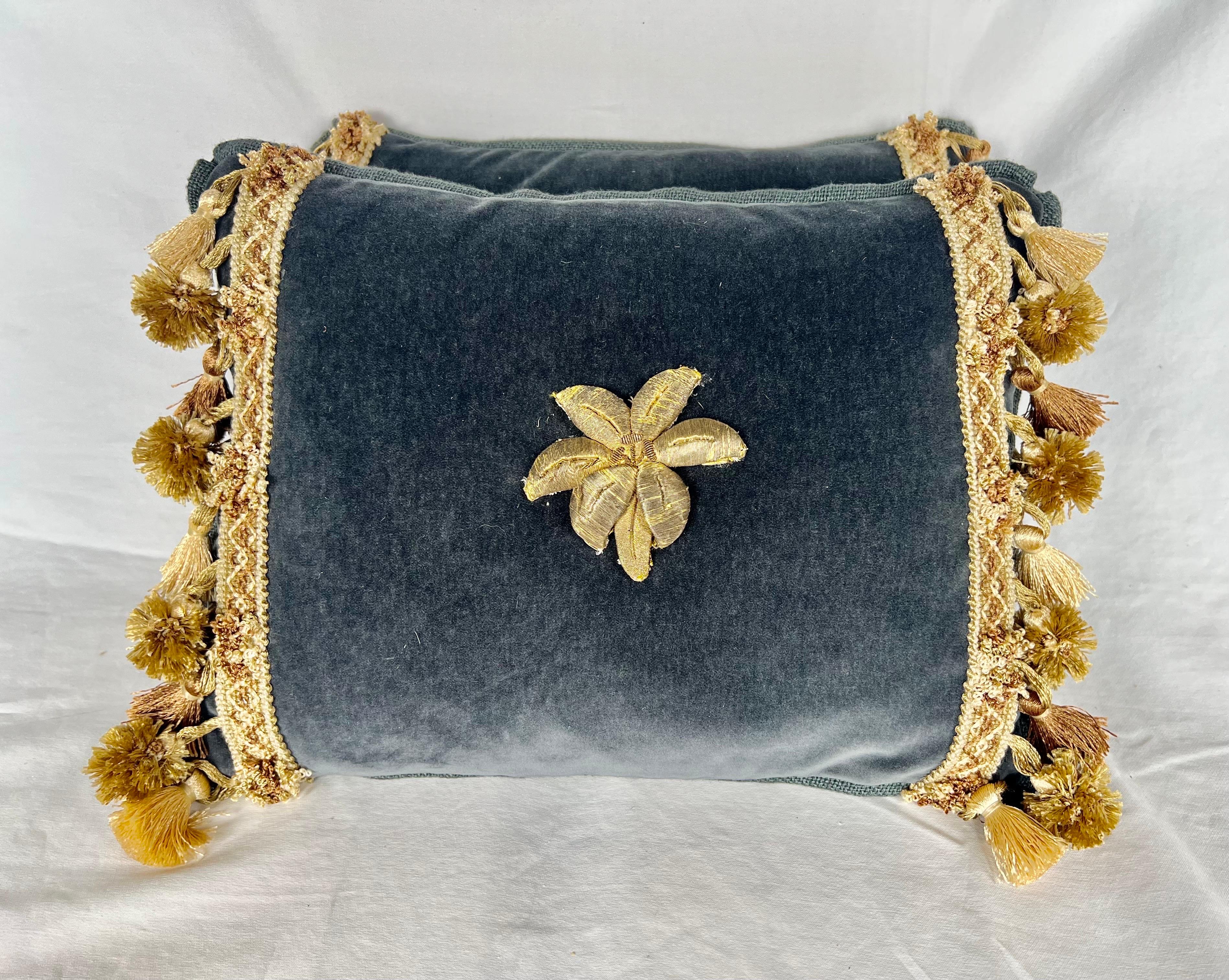 Pair of custom contemporary pillows made with 19th century gold metallic flowers applied to dark blue silk mohair.  Linen backs, down inserts, zipper closures.