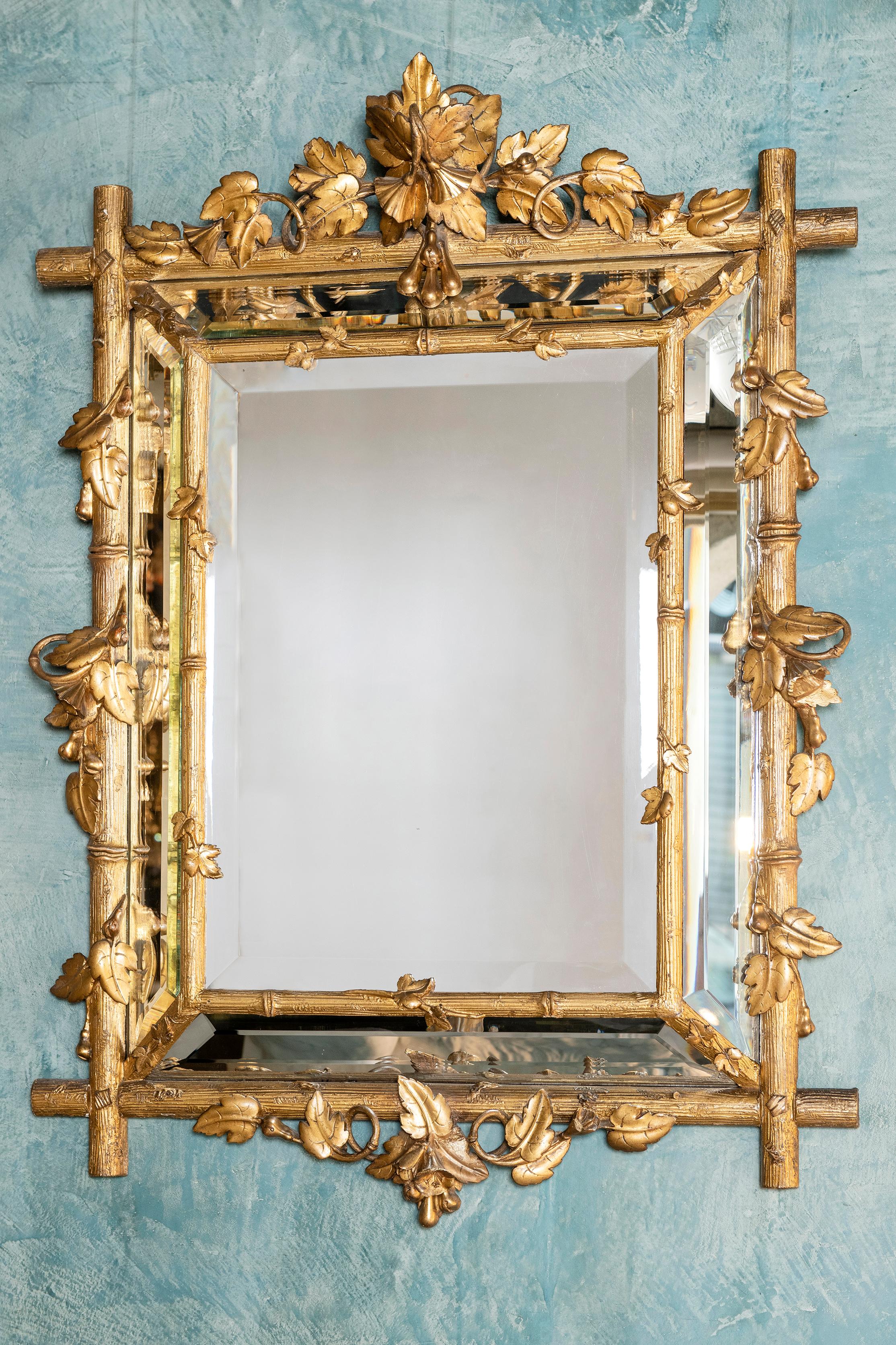 Pair of gold patinated wood mirrors. England, late 19th century.