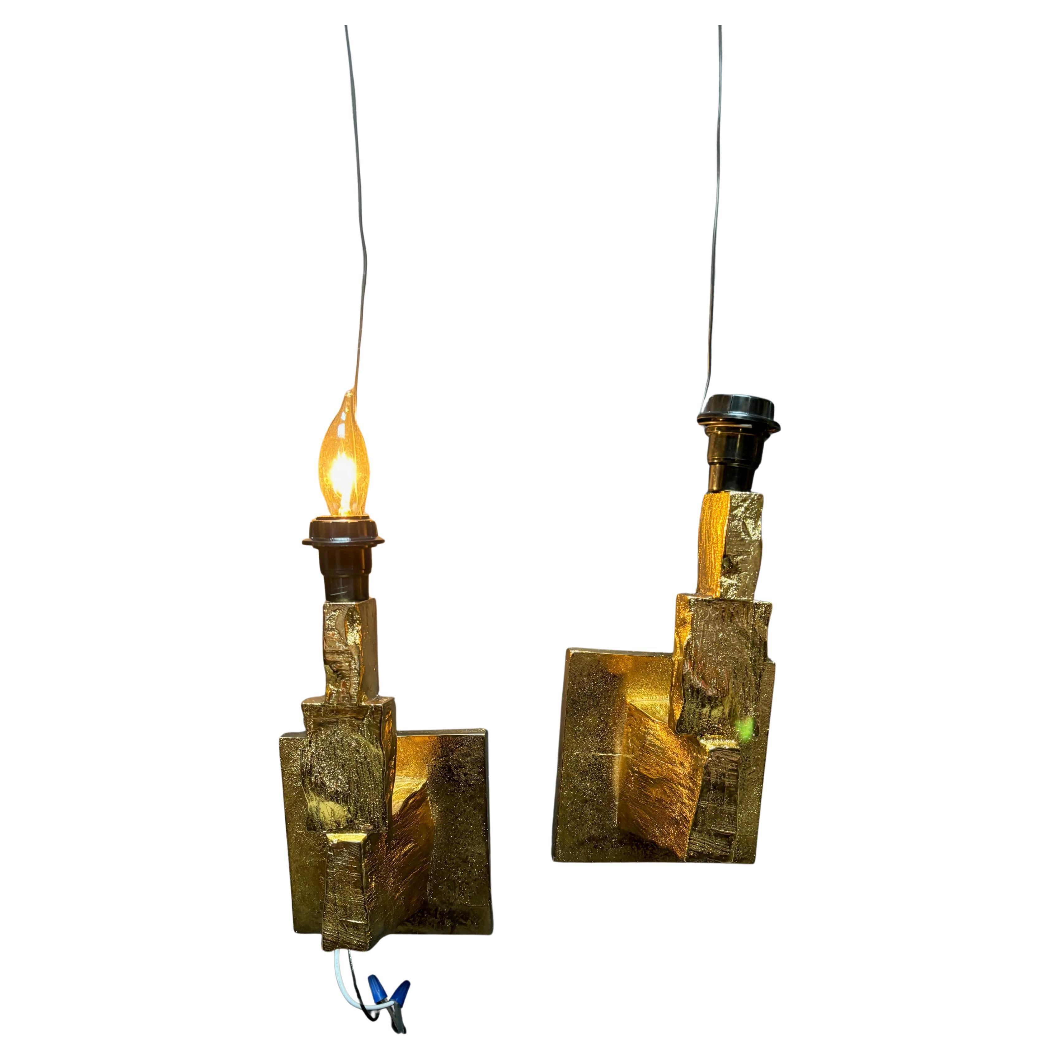 Pareja de candelabros dorados