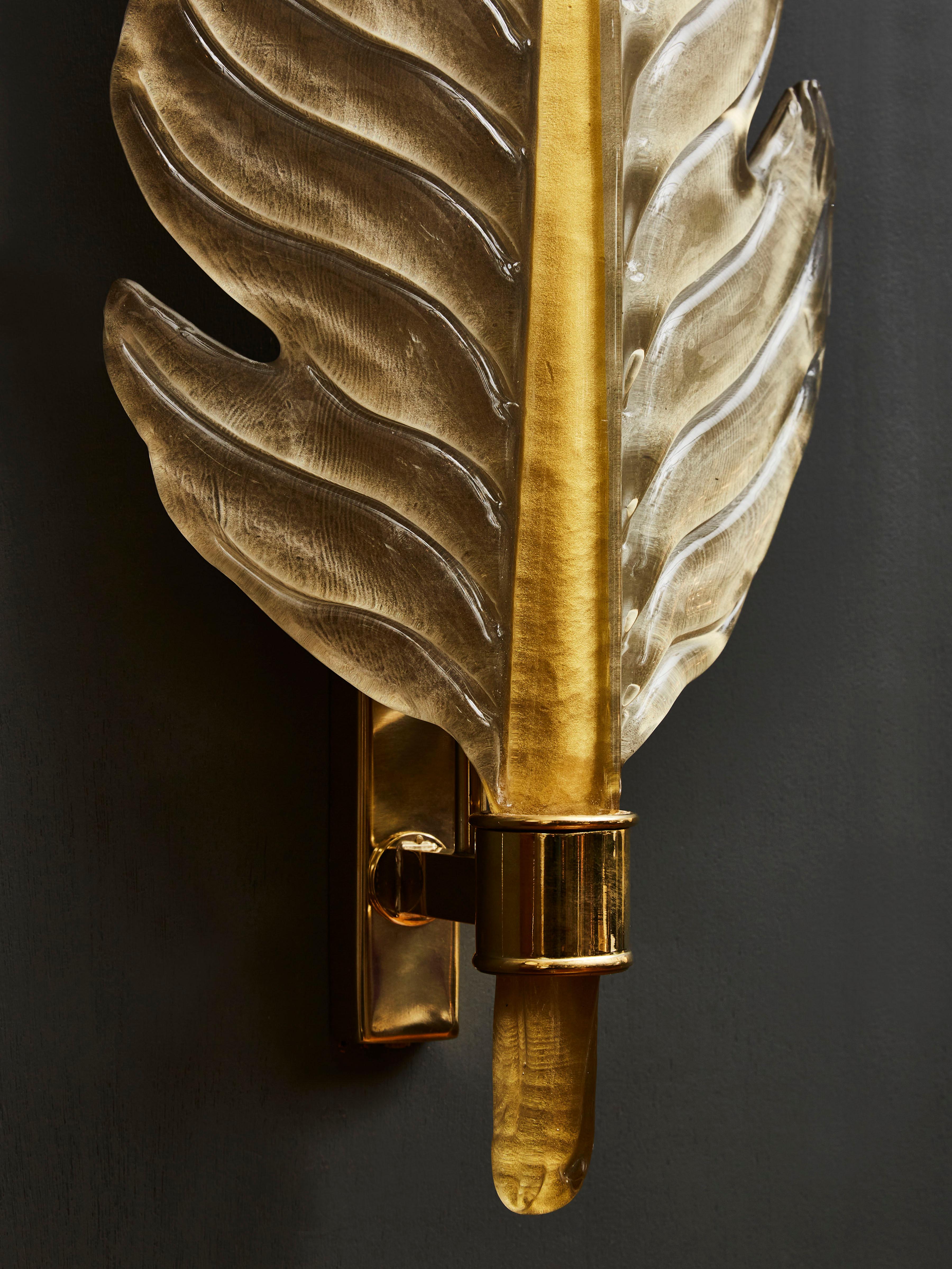 Contemporary Pair of Gold Tinted Murano Glass Leaves Wall Sconces with Brass Setting For Sale