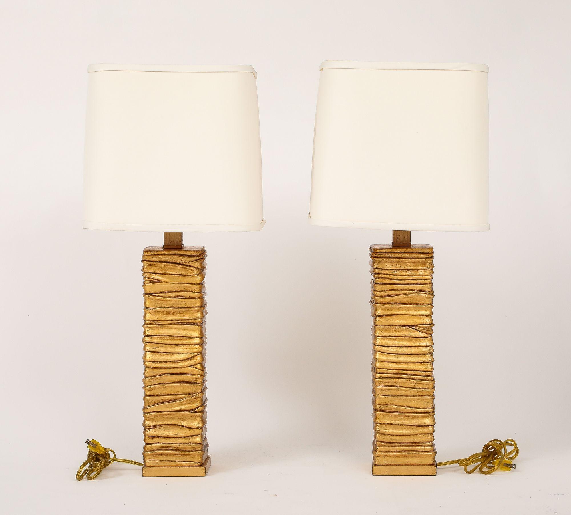 Plâtre Pair of Gold Tone Metalic Column Lamps. en vente