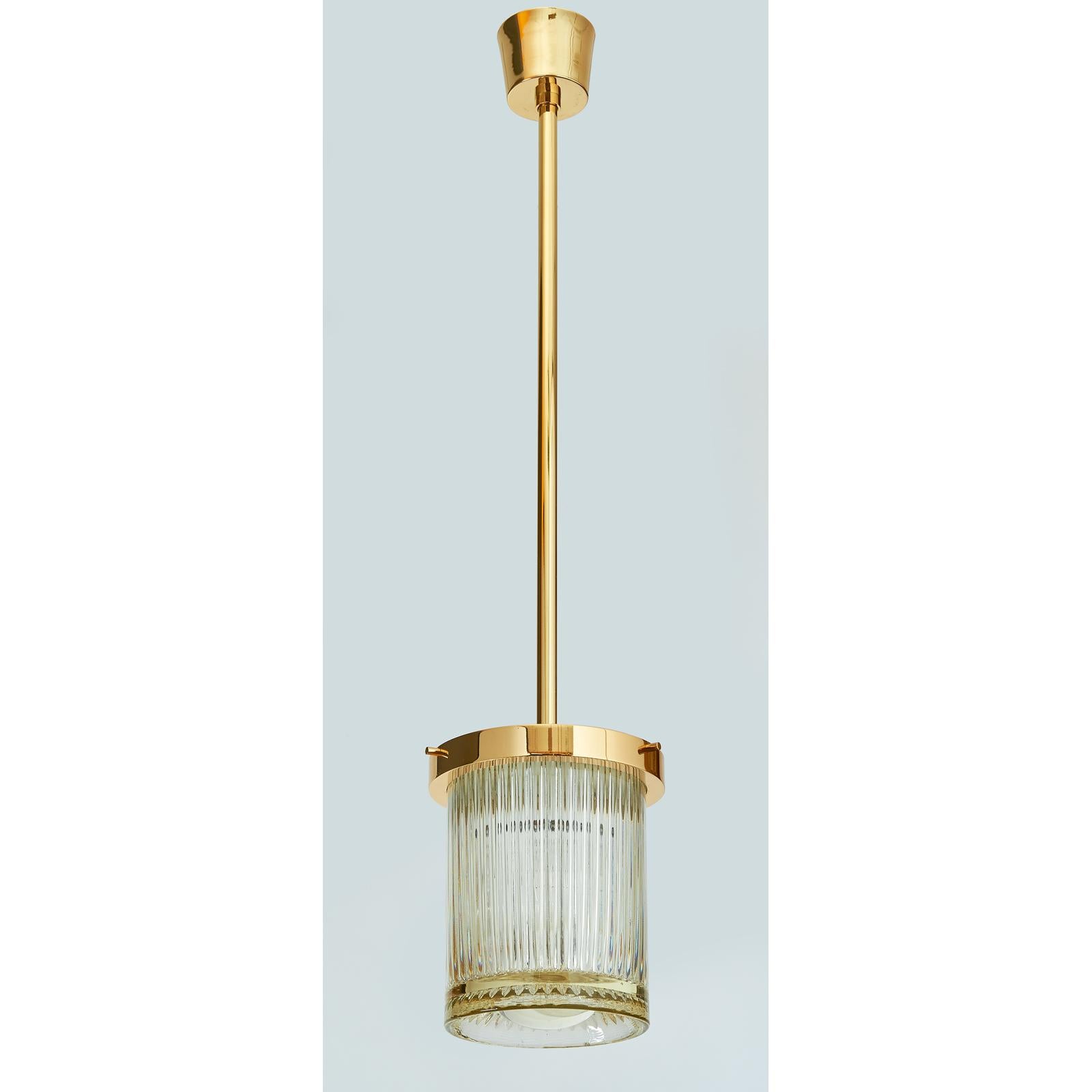 Contemporary Pair of Gold Toned Ribbed Glass Lanterns For Sale